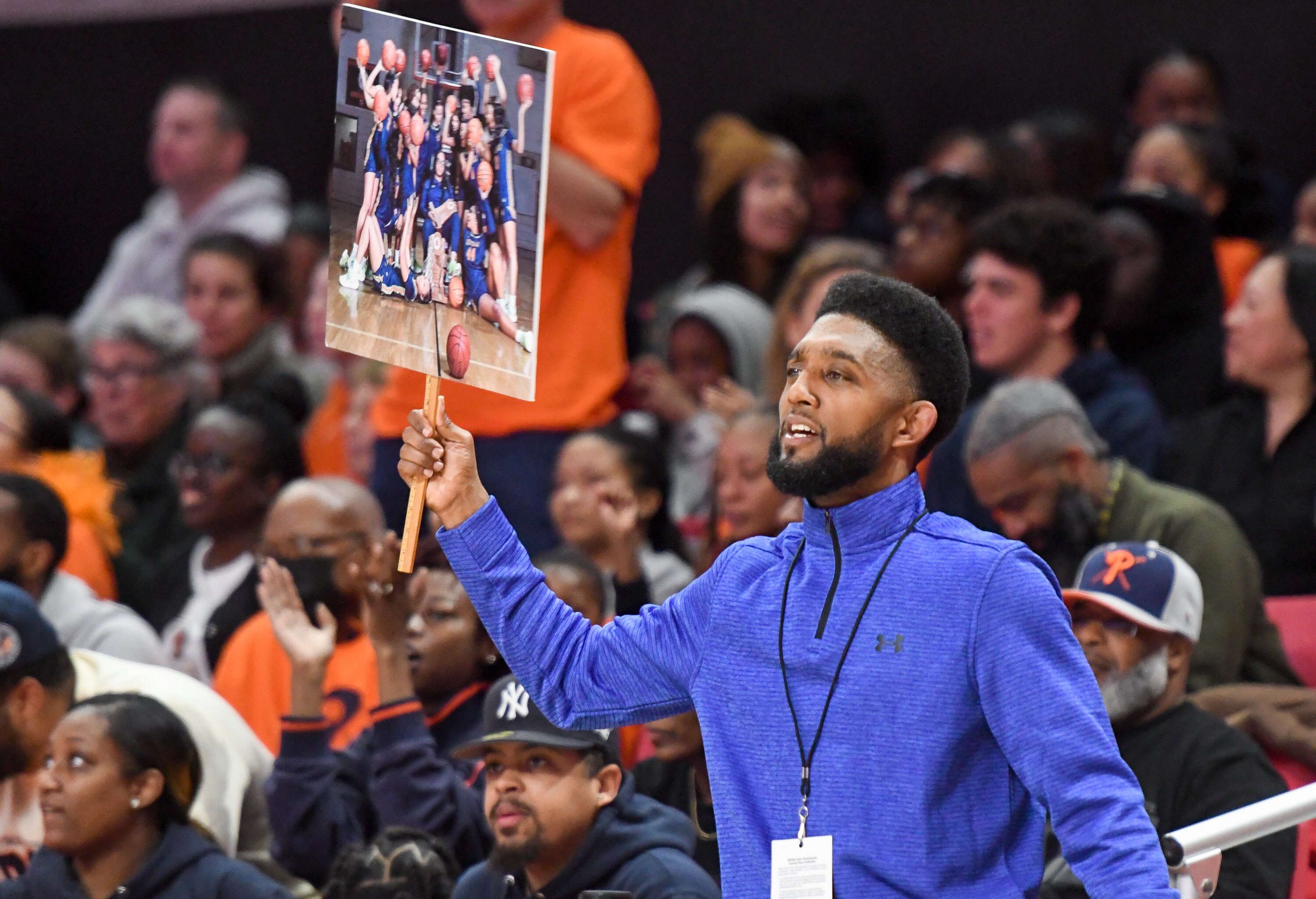 Baltimore Mayor Brandon Scott cheers for Poly during the Class 3A state girls basketball final against Howard in College Park last year. (Photo by Steve Ruark for the Baltimore Banner)
