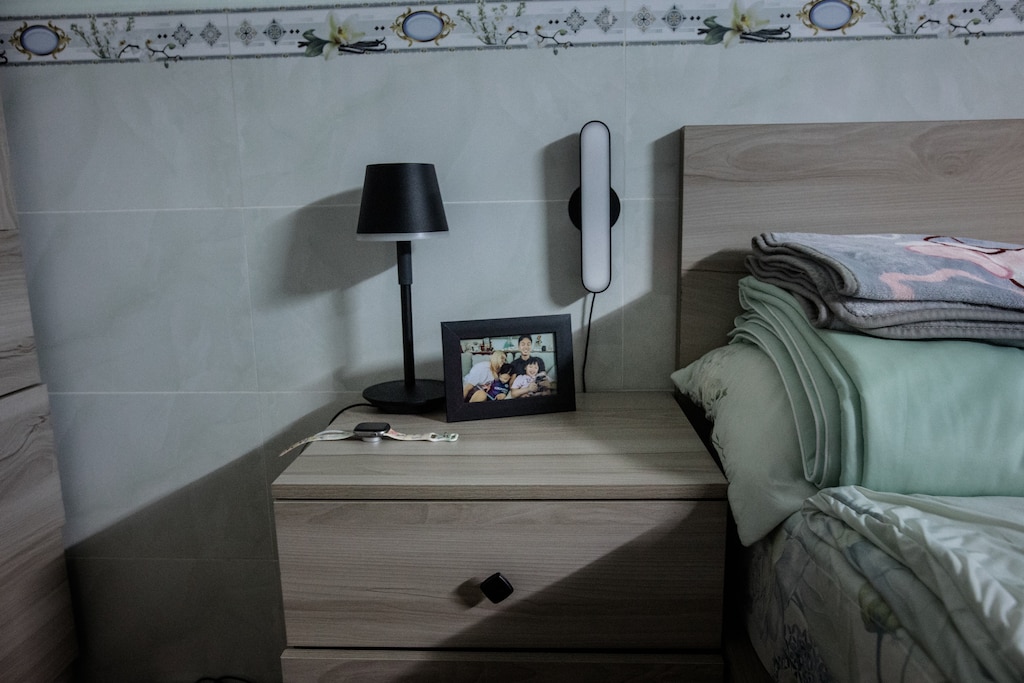 Dong Nai, Vietnam - Aug 1, 2026: A framed photograph of Melissa Tran’s children is seen in her room in Dong Nai, Vietnam on August 1, 2026. Rosem Morton for The Baltimore Banner