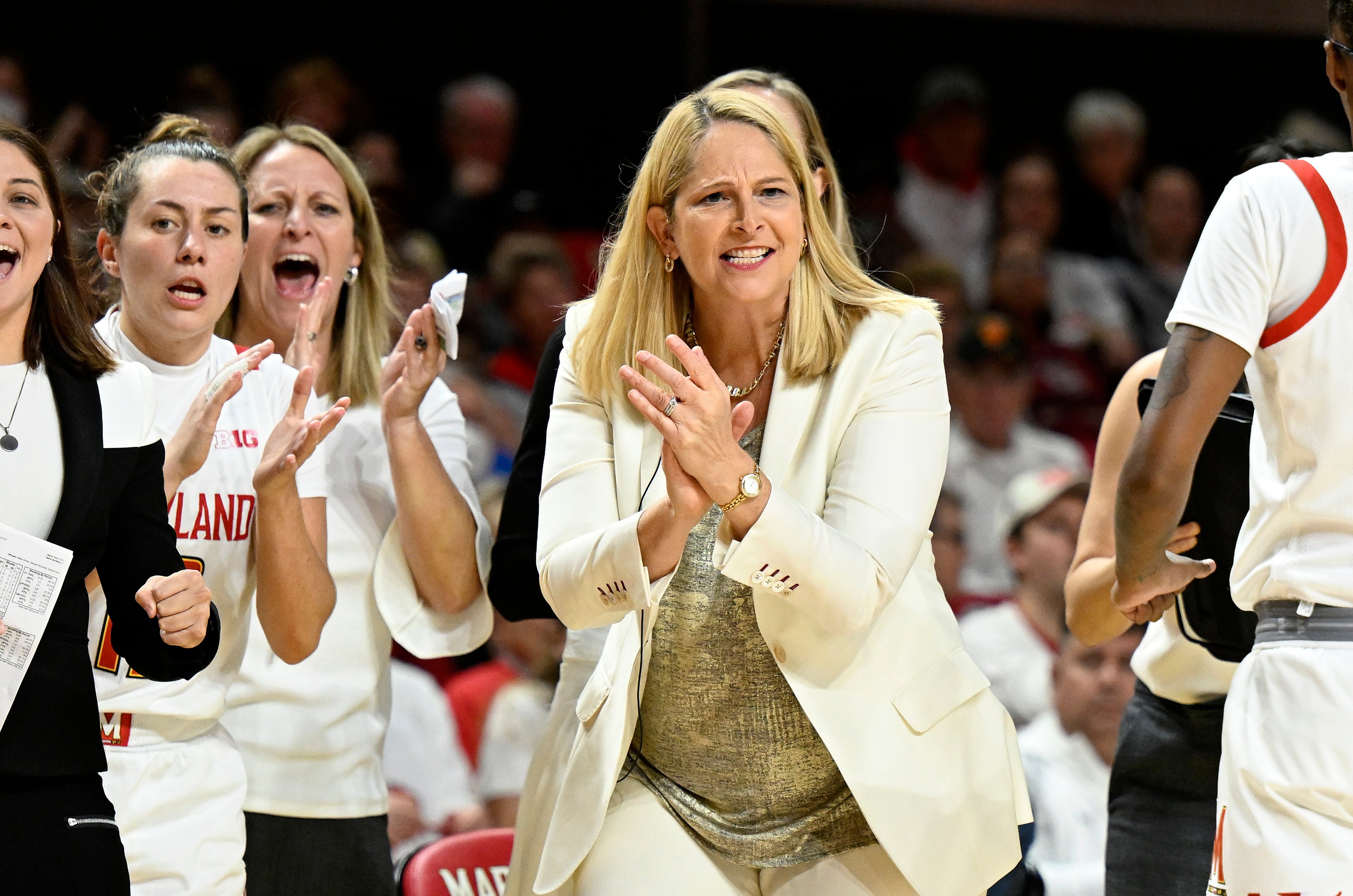 COLLEGE PARK, MARYLAND - NOVEMBER 11: Head coach Brenda Frese of the Maryland Terrapins celebrates during the first half against the South Carolina Gamecocks at Xfinity Center on November 11, 2022 in College Park, Maryland. (Photo by Greg Fiume/Getty Images)