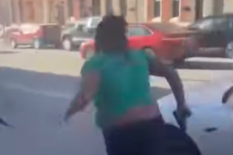 In a still from a cellphone video that went viral on social media, Unique Thorn is seen running down East Preston Street in Johnston Square with a gun in her hand before fatally shooting Shy’Keema Turner on March 18, 2025.