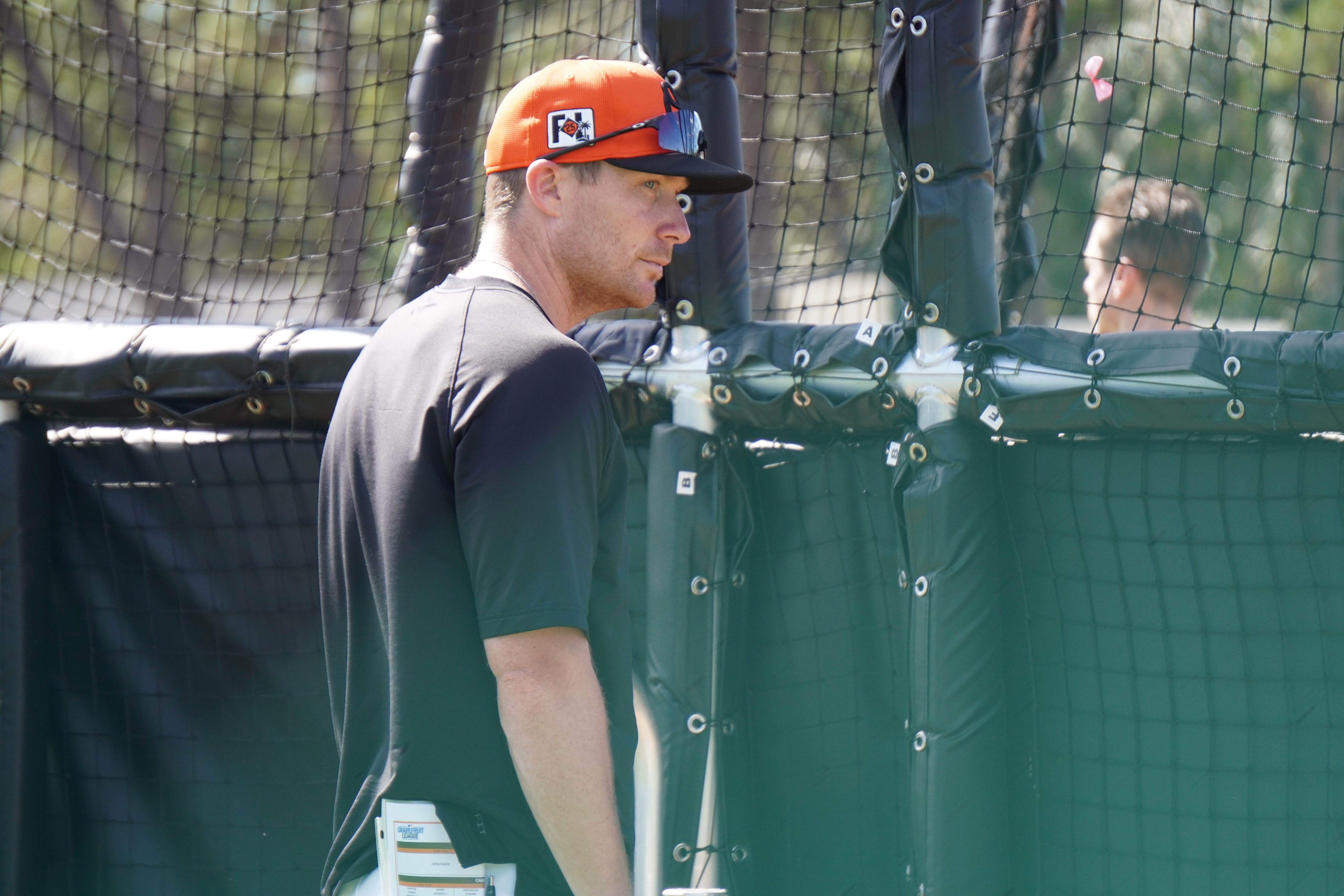 Orioles hitting coach Code Asche watches batting practice at spring training (Feb. 15, 2025).