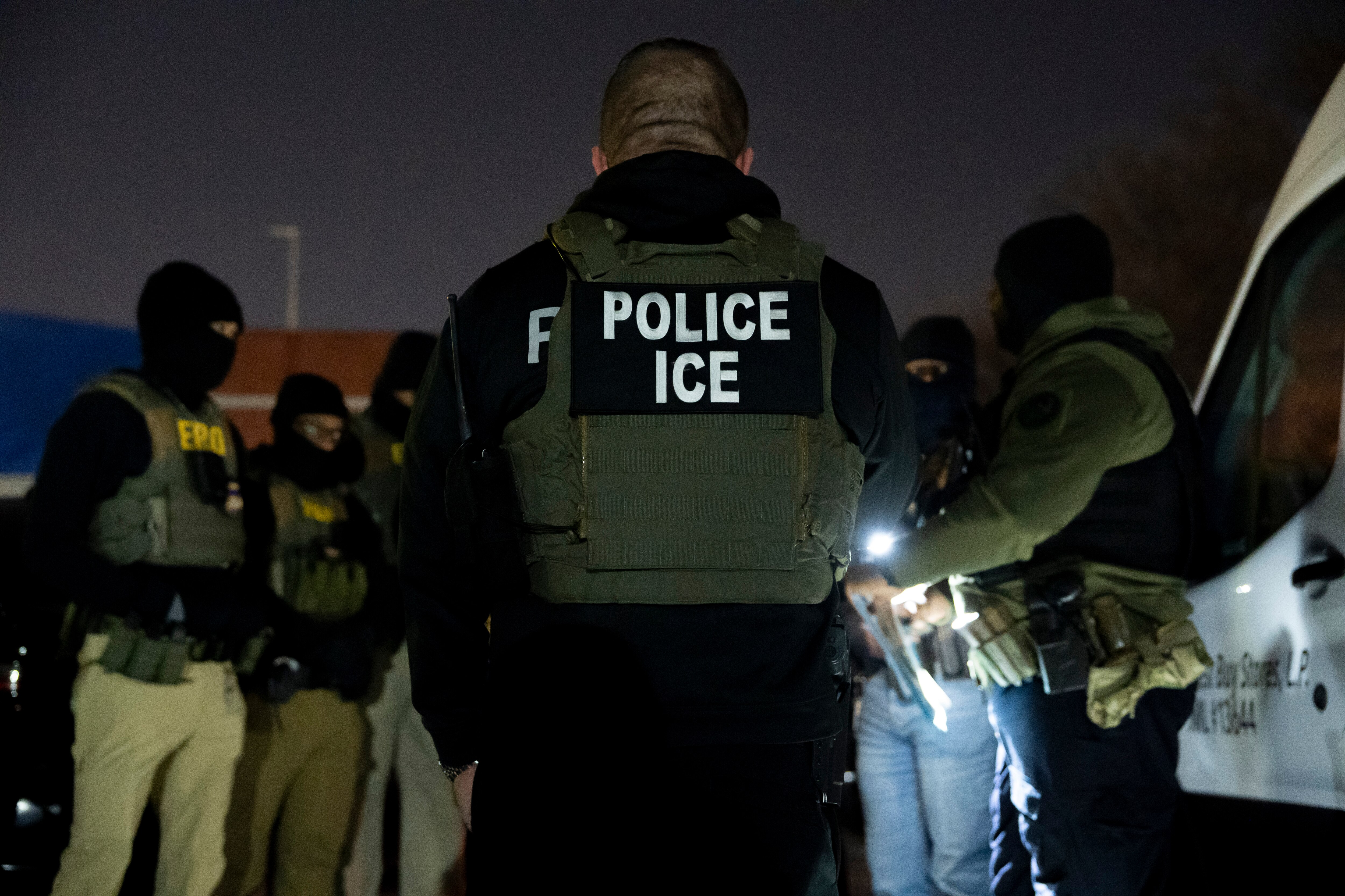 U.S. Immigration and Customs Enforcement officers gather for a briefing before an enforcement operation, Monday, Jan. 27, 2025, in Silver Spring, Md.