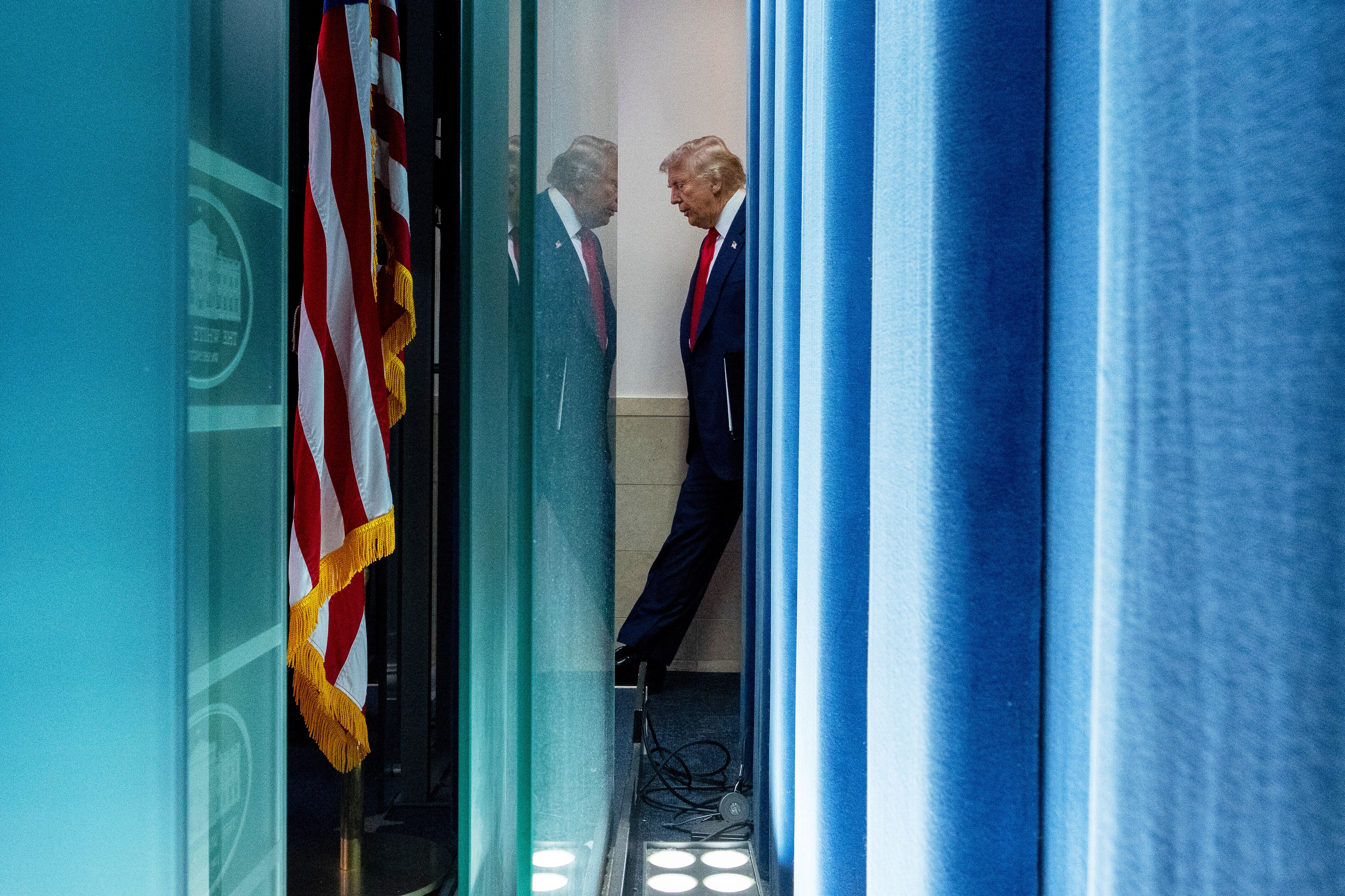 President Donald Trump arrives to speak with reporters in the James Brady Press Briefing Room at the White House, Monday, Aug. 11, 2025, in Washington.