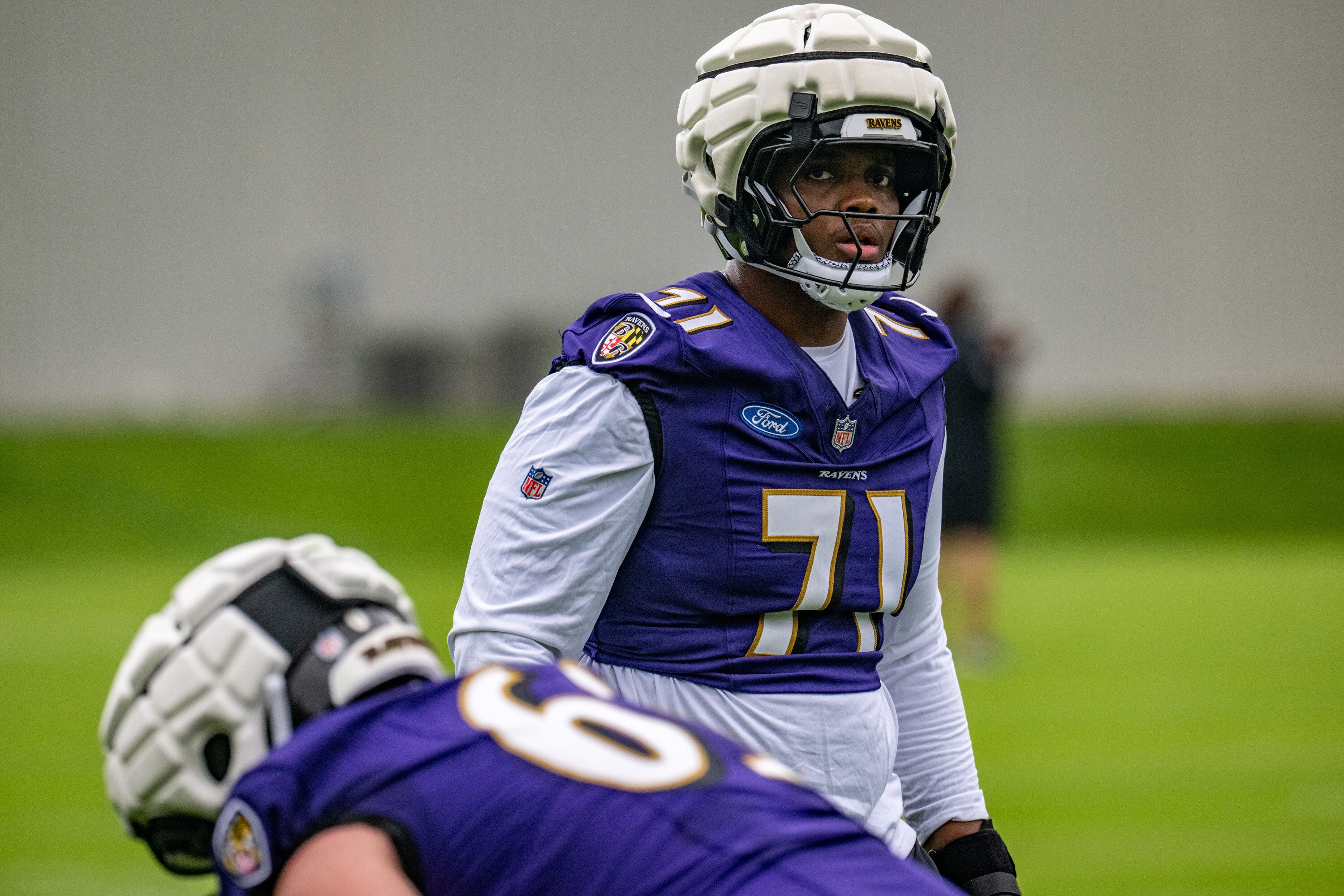 Ravens rookie Carson Vinson, 71, works out at mini-camp in Owings Mills on Sunday, May 4.