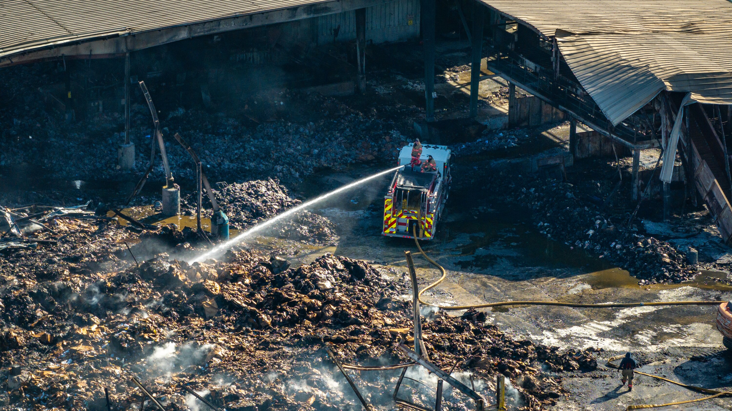A fire at the Owl Metals Inc. recycling facility in Dundalk rekindled Thursday after initially starting over the weekend. As of Friday, firefighters say it is nearly extinguished.