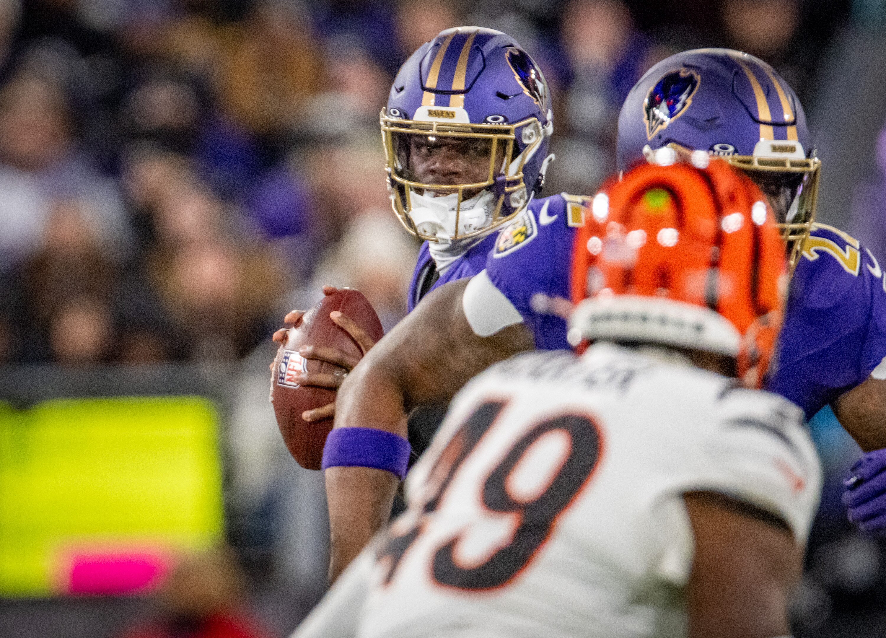 Baltimore Ravens quarterback Lamar Jackson looks for a receiver down field against the Cincinnati Bengals last month.