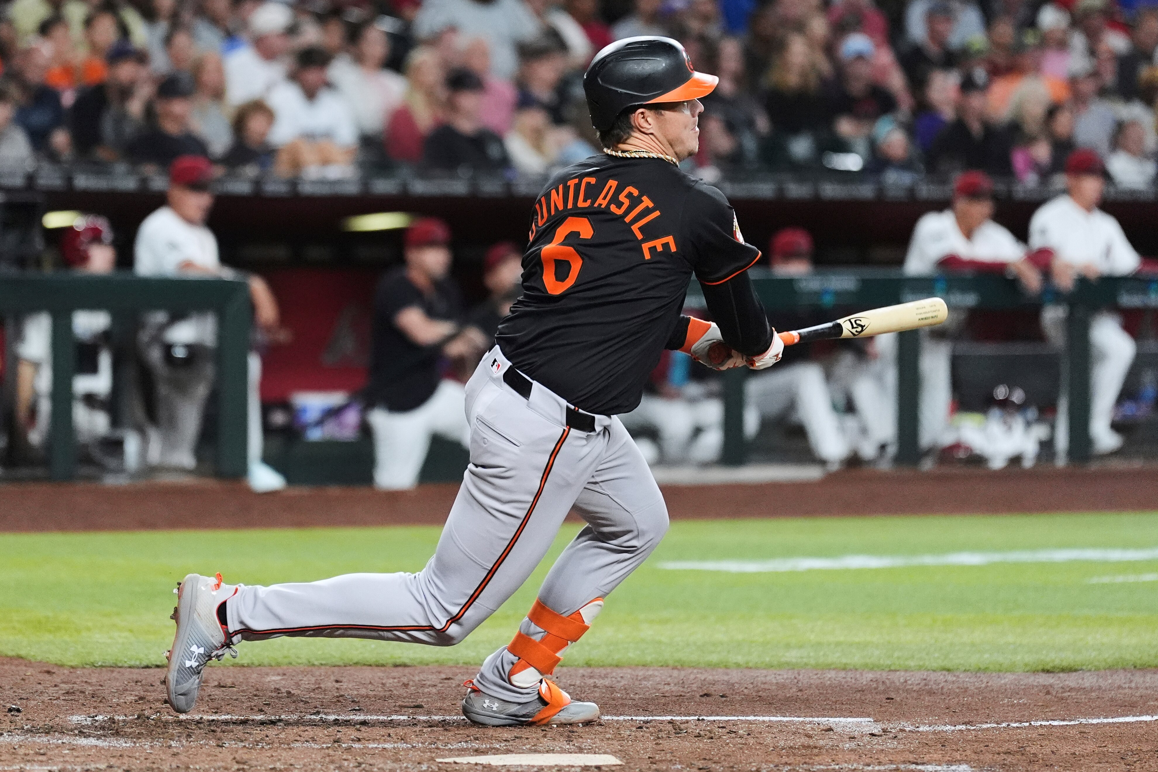 Baltimore Orioles' Ryan Mountcastle watches the flight of his two-run single in the fifth inning.