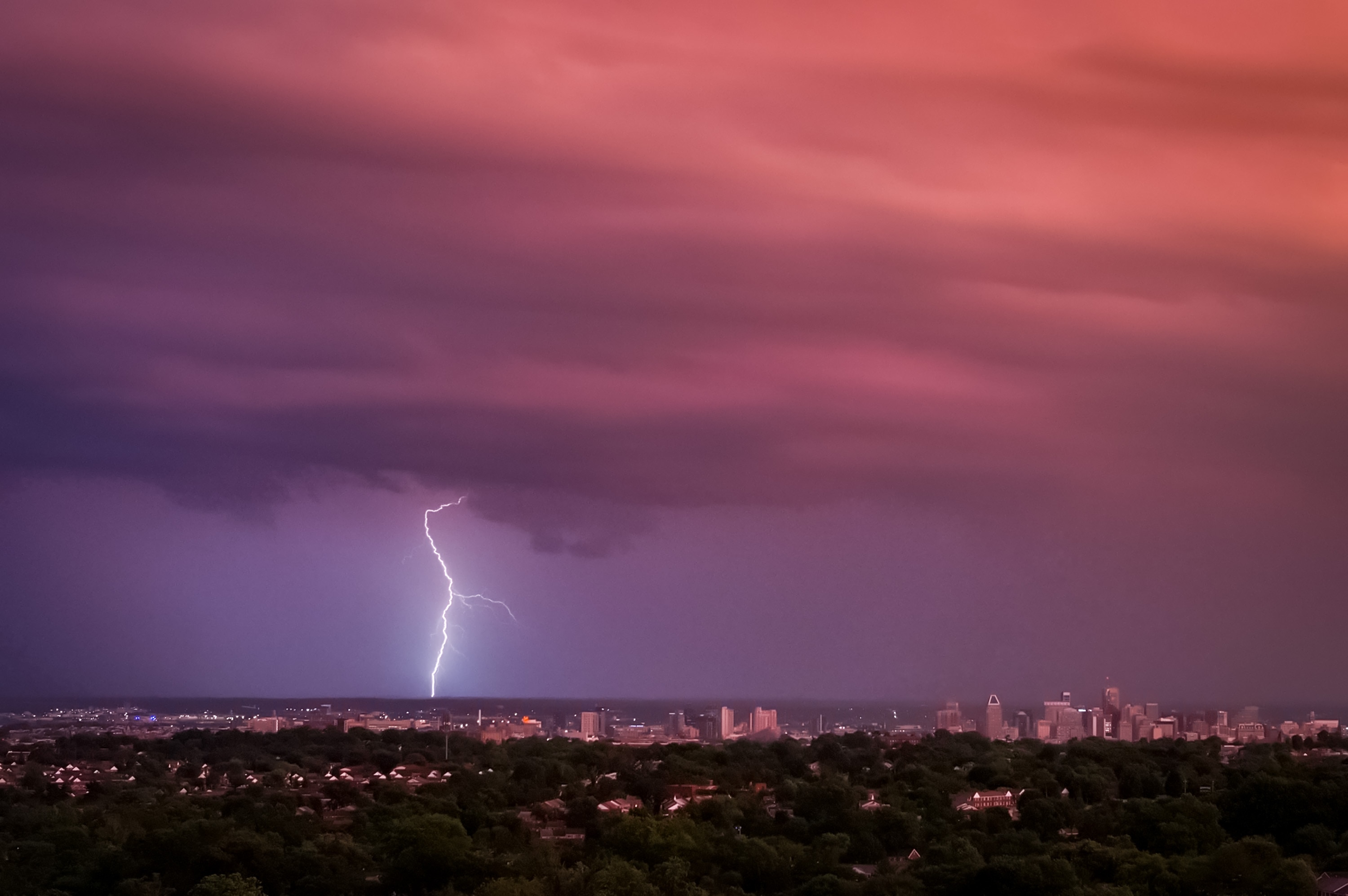 Lightning strikes south of downtown Baltimore at sunset Friday. 