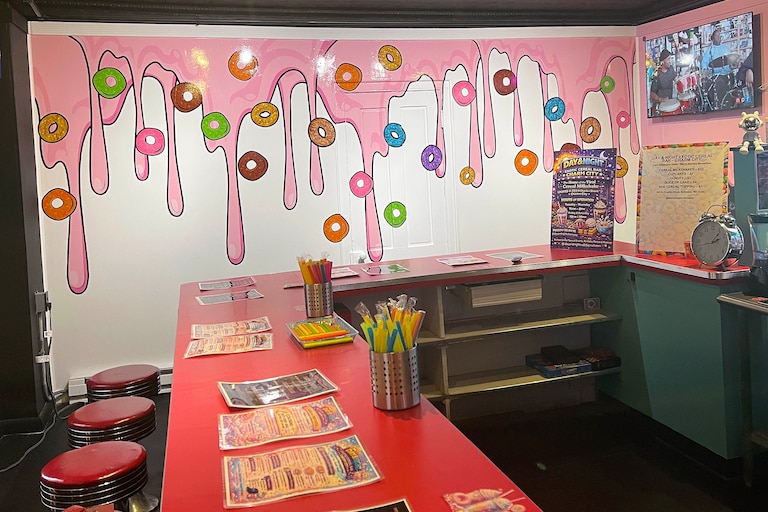 Donuts wrap the walls at Day & Night Exotic Cereal Bar, located at 333 N. Charles St.
