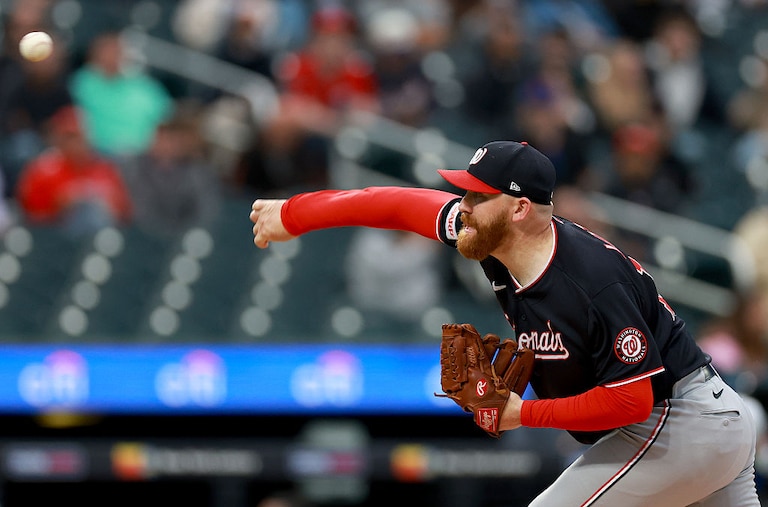 Washington Nationals starter Zack Littell delivers a pitch to Bo Bichette of the New York Mets in the first inning.