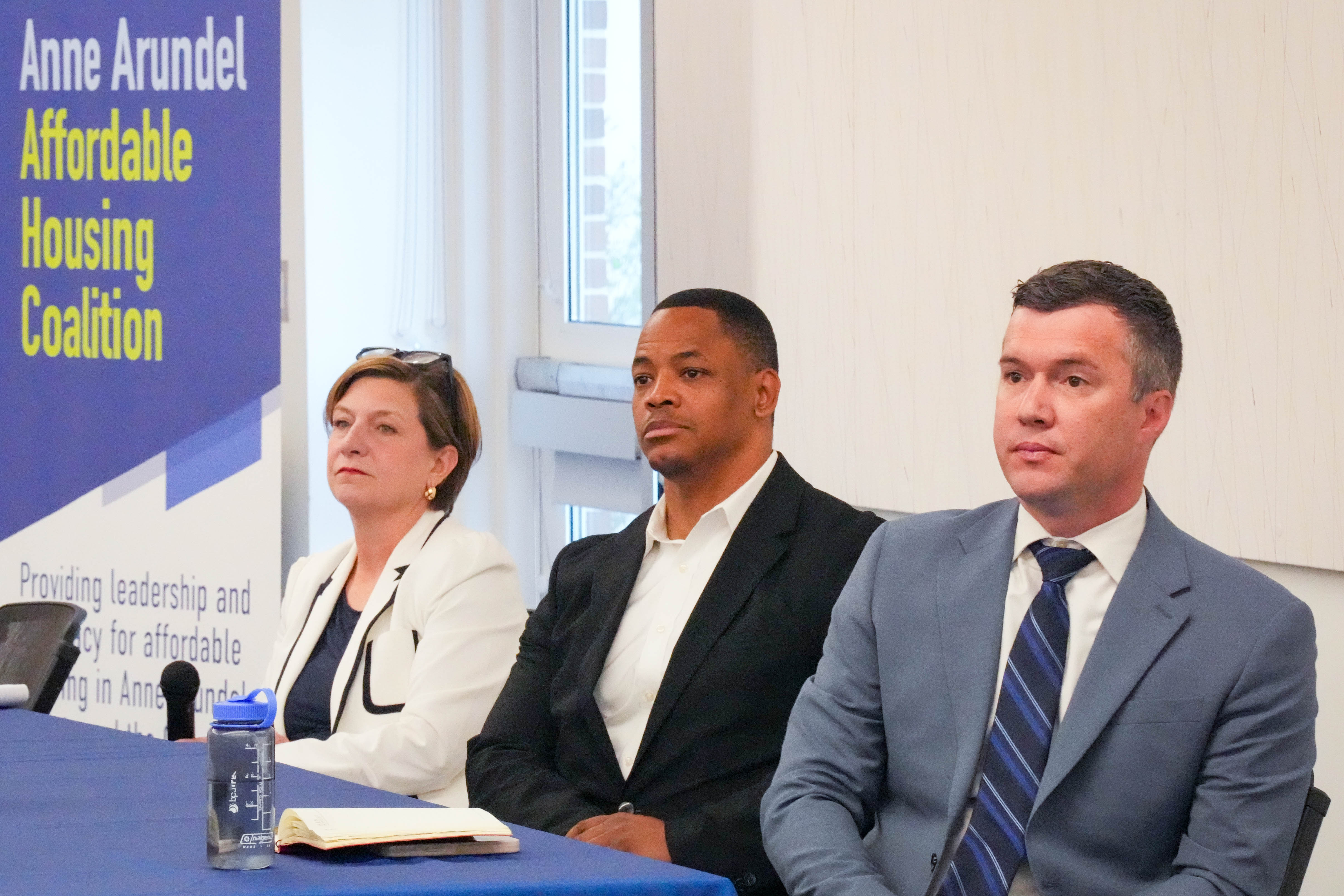 Anne Arundel County executive candidates Allison Pickard, Pete Smith and James Kitchin during a forum on affordable housing and development on Thursday.