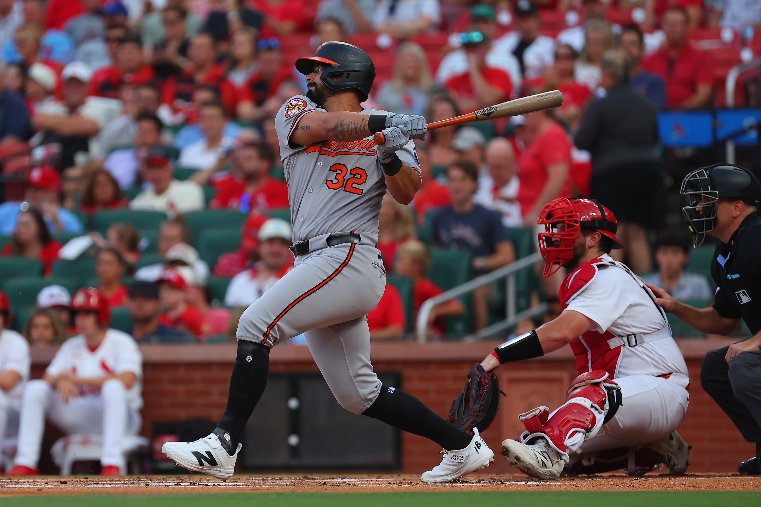 Christian Encarnacion-Strand hits an RBI single in the first inning Wednesday night at St. Louis.