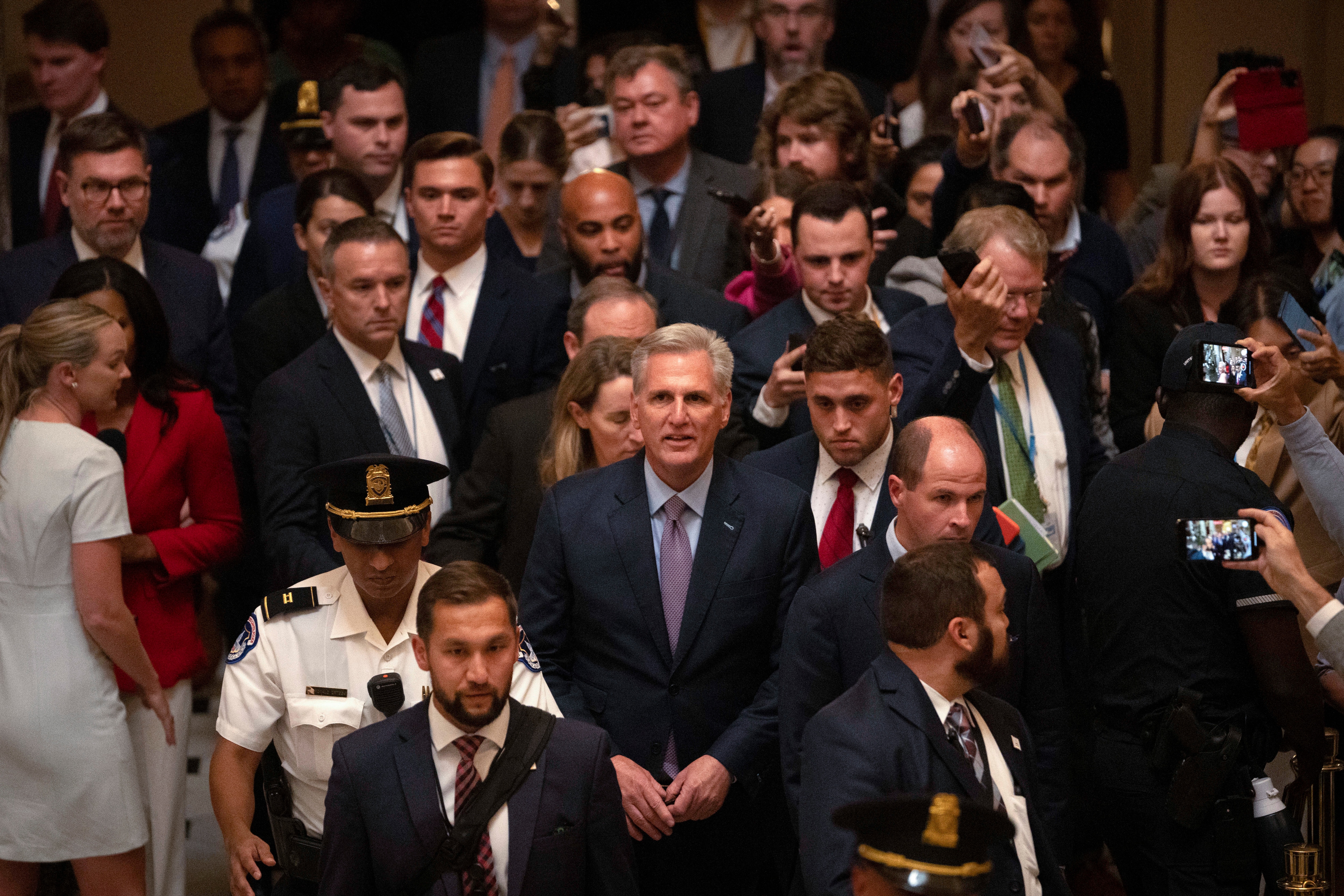 U.S. Rep. Kevin McCarthy, R-Calif., leaves the House floor after being ousted as speaker of the House at the Capitol in Washington, Tuesday, Oct. 3, 2023. (AP Photo/Mark Schiefelbein)