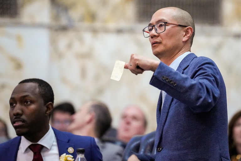 House Majority Leader Del. David Moon (right) shows a sticky note to Speaker Adrienne A. Jones in the Maryland State House during Sine Die, the final day of the 2024 General Assembly Session in Annapolis, on April 8, 2024.