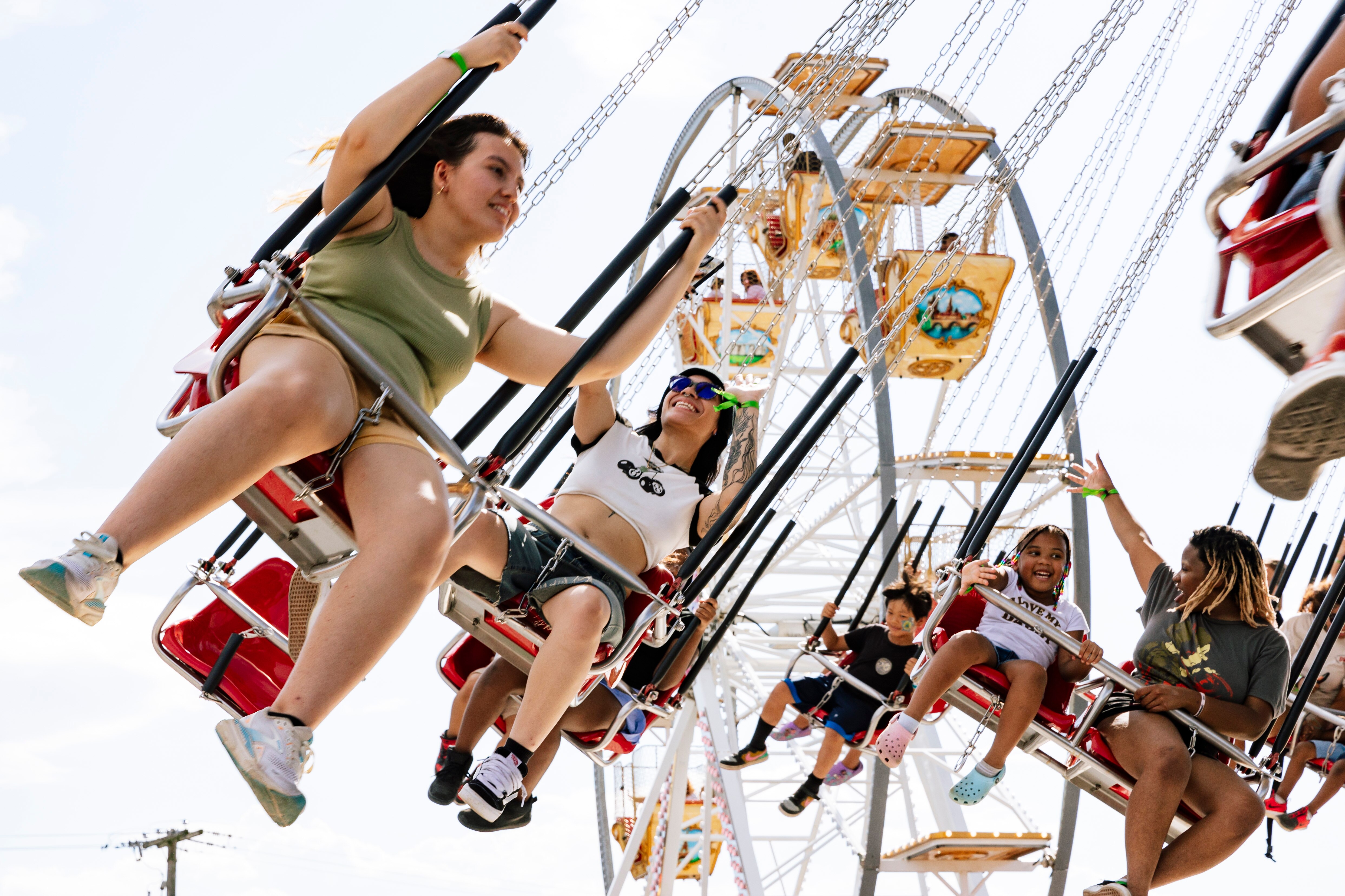Fairgoers ride the swing ride at the Howard County Fair, which runs until Saturday in West Friendship.