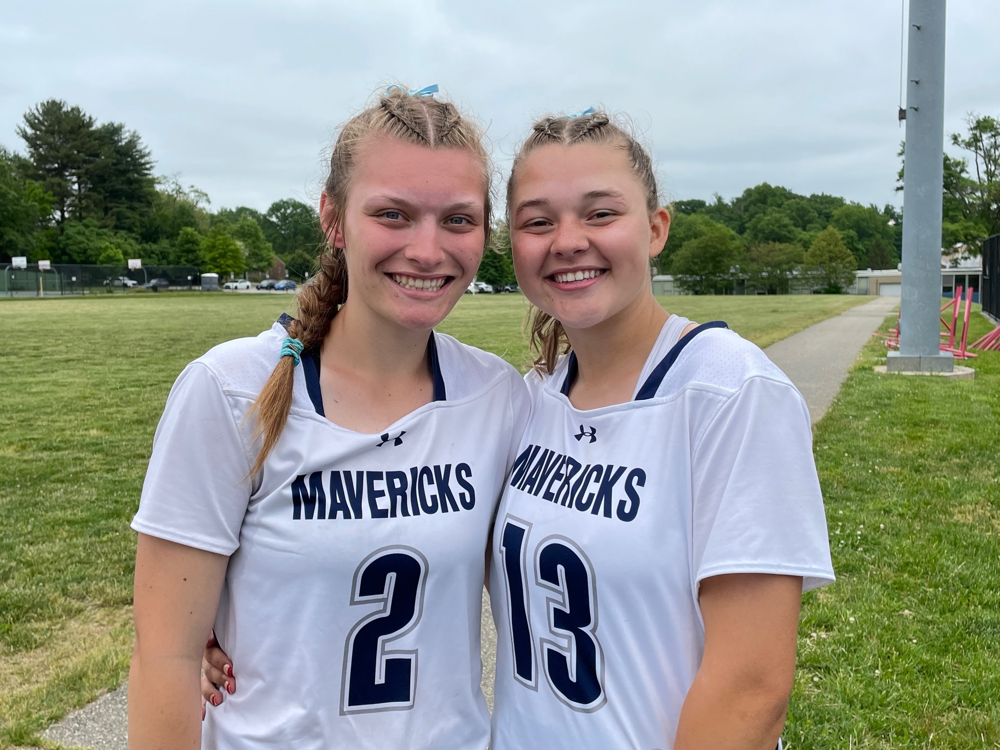 Manchester Valley attacker Haylee Bittinger (2) and defender Aubrey Chopper (13) played key roles on the draw while Bittinger scored three goals as the No. 6 Mustangs slipped past C. Milton Wight, 11-10, in the Class 2A state semifinals Saturday. Next week, the Mavericks, the only undefeated public school team in the state at 18-0, will go after their first state championship since 2016.