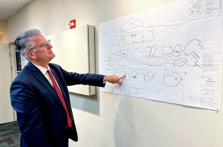 Gene Condon, general manager of Arundel Mills mall, points to a map of the shopping center, showing where a Wayfair outlet will go in early 2026.