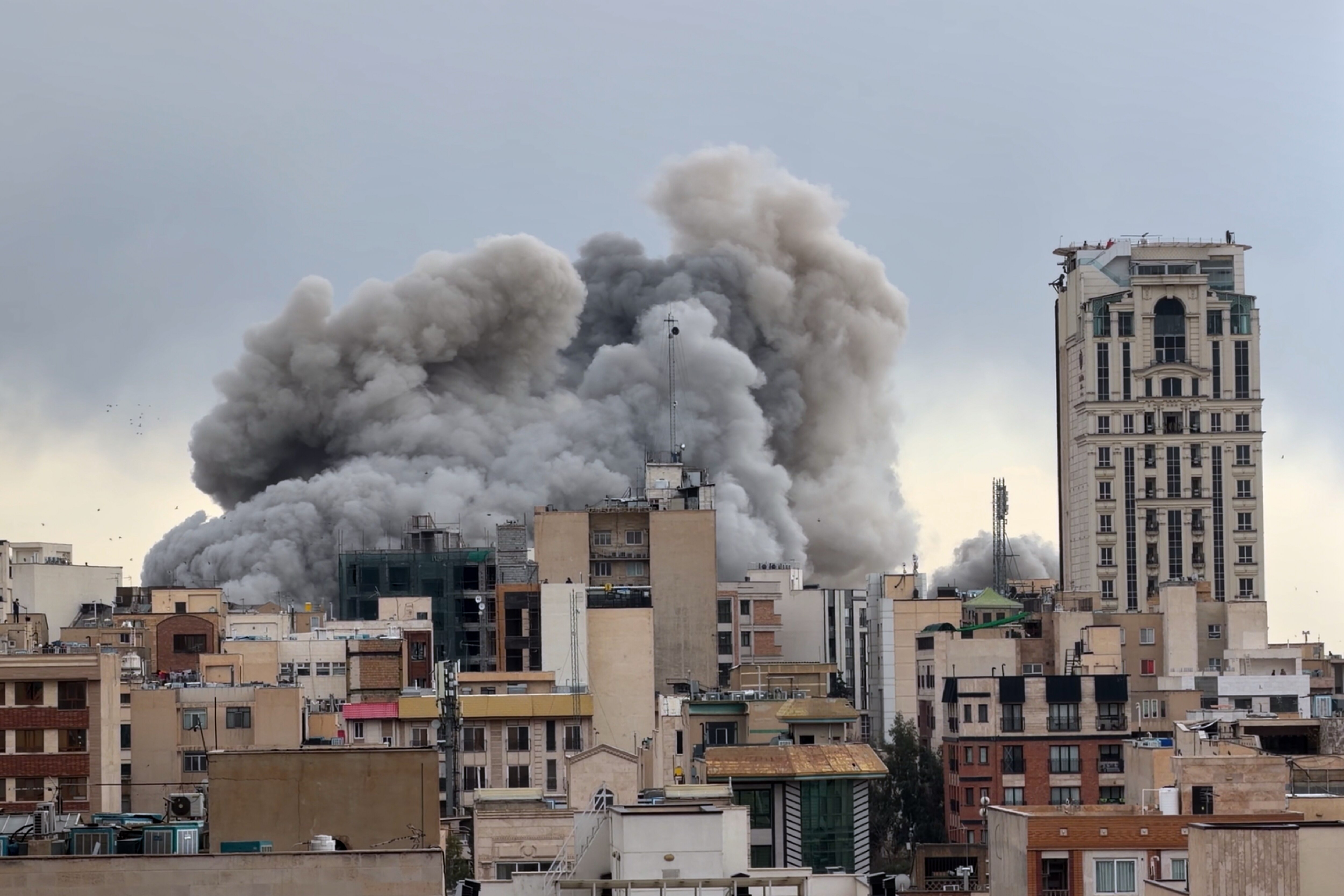 FILE - A plume of smoke rises after a strike in Tehran, Iran, Monday, March 2, 2026. (AP Photo/Mohsen Ganji, File)