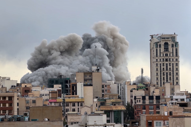 FILE - A plume of smoke rises after a strike in Tehran, Iran, Monday, March 2, 2026. (AP Photo/Mohsen Ganji, File)