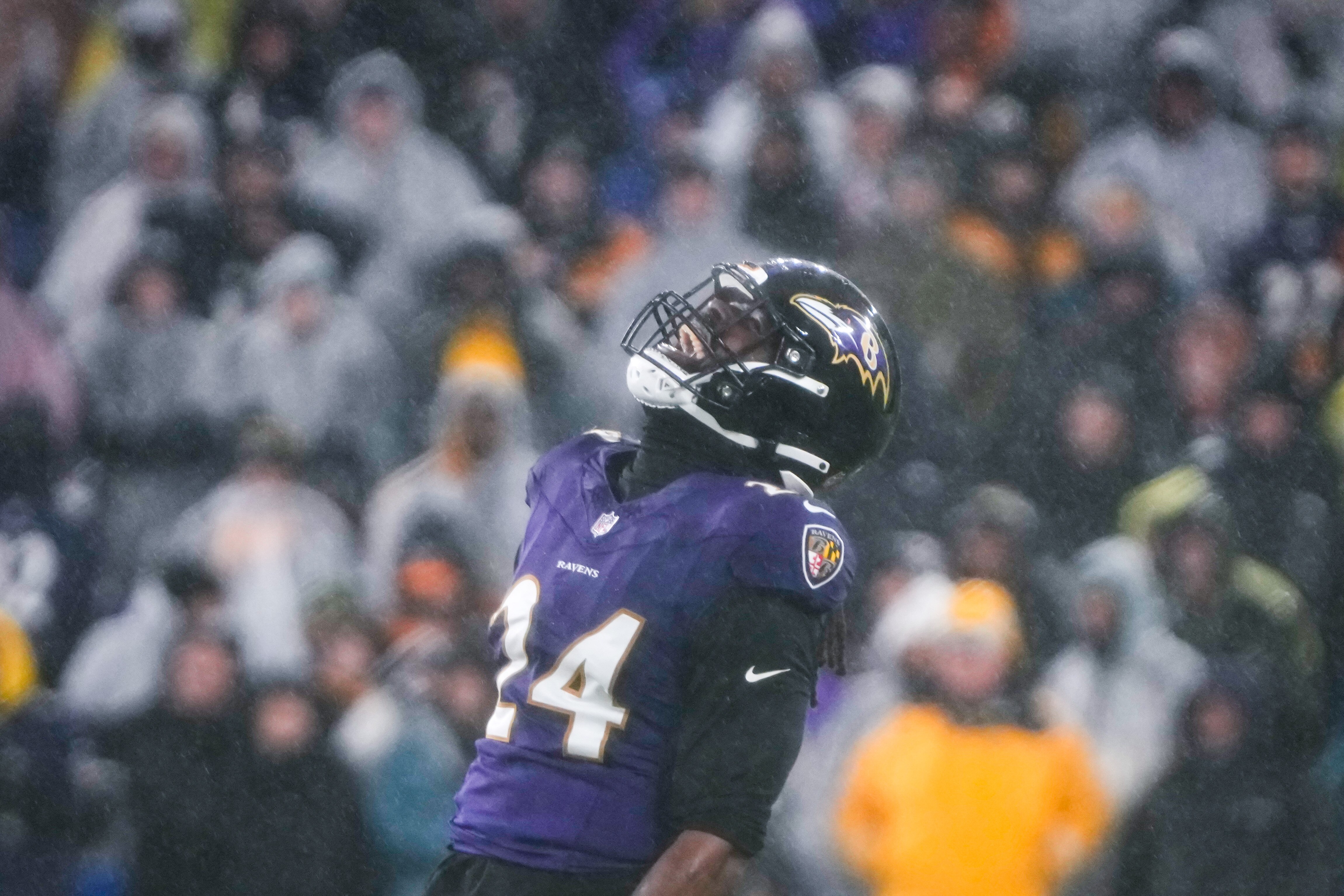 The Ravens' Jadeveon Clowney laughs and dances in an extended sack celebration Saturday.