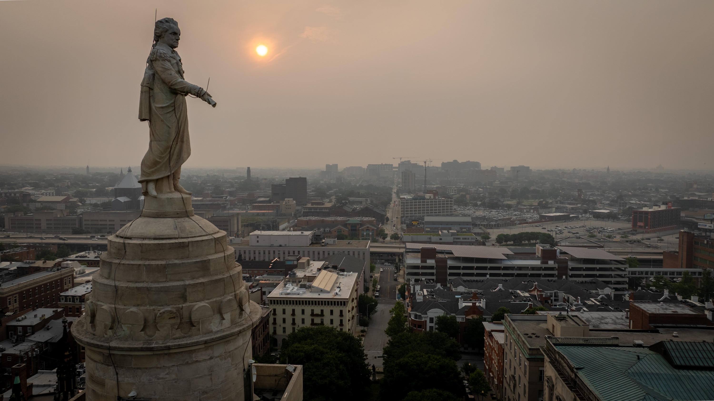 Wildfire smoke from Canada created a hazy sunrise over Baltimore on Thursday.