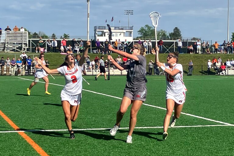 (From left) McDonogh junior midfielders Amanda Lawson and Remi Schaller double-team Glenelg Country School junior midfielder Maggie Flanagan in the No. 1 Eagles’ 13-4 victory in an IAAM A Conference semifinal on Tuesday. McDonogh will meet two-time defending champion St. Paul’s School for Girls for in the title game Friday night at USA Lacrosse’s Tierney Field in Sparks.