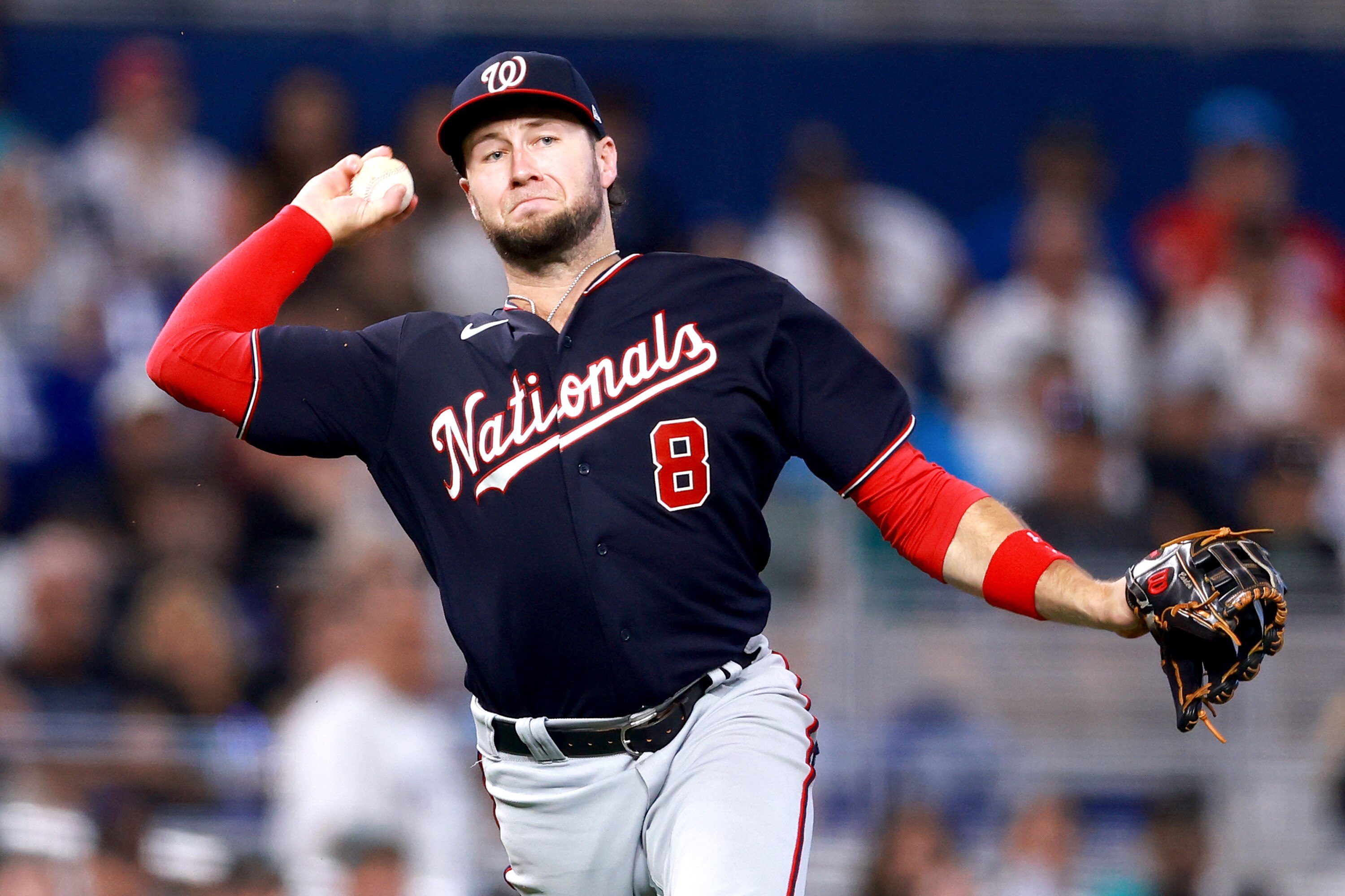 MIAMI, FLORIDA - AUGUST 27: Carter Kieboom #8 of the Washington Nationals throws to first base for an out against the Miami Marlins during the seventh inning at loanDepot park on August 27, 2023 in Miami, Florida. (Photo by Megan Briggs/Getty Images)