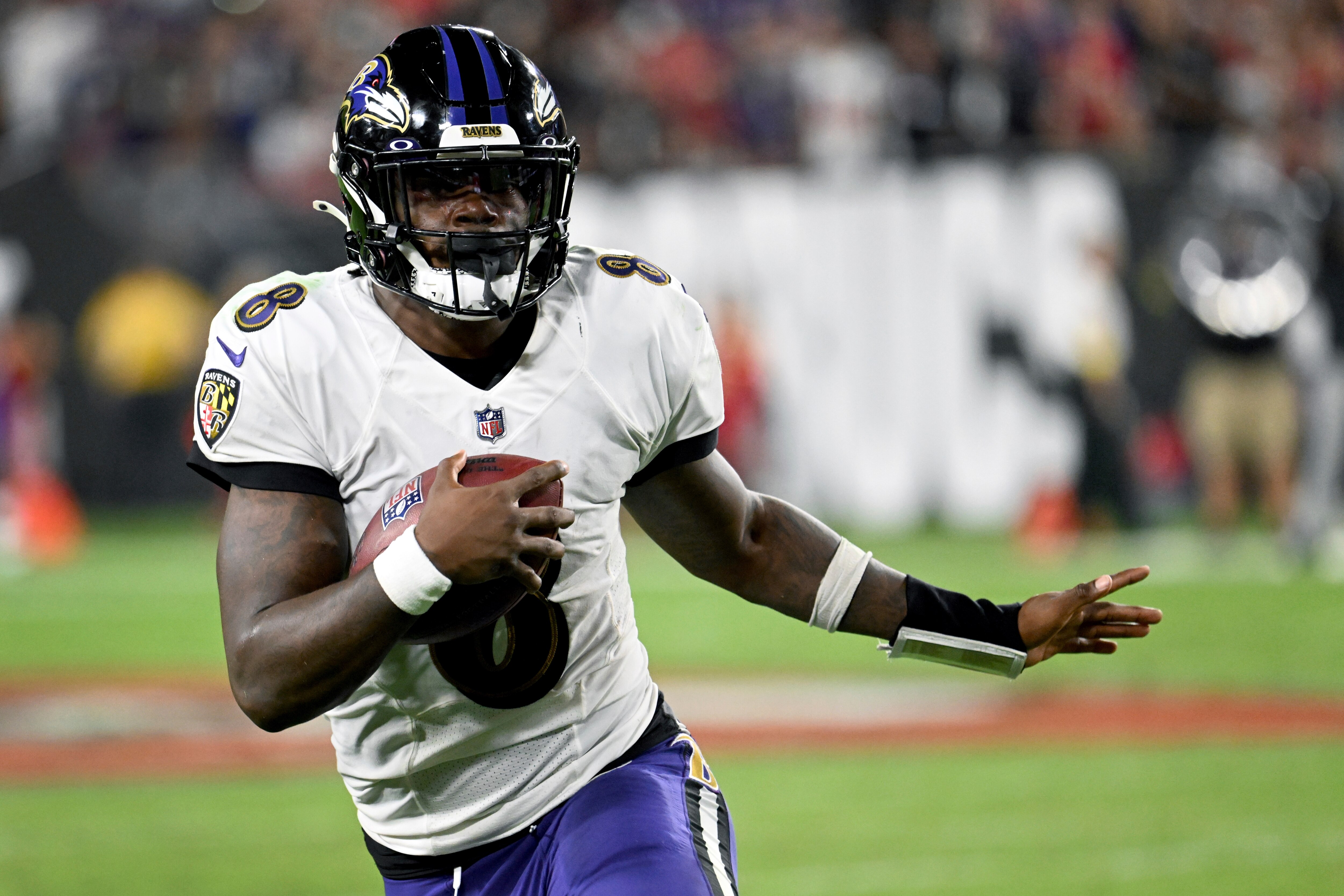 Baltimore Ravens quarterback Lamar Jackson scrambles during the second half of an NFL football game against the Tampa Bay Buccaneers Thursday, Oct. 27, 2022, in Tampa, Fla.