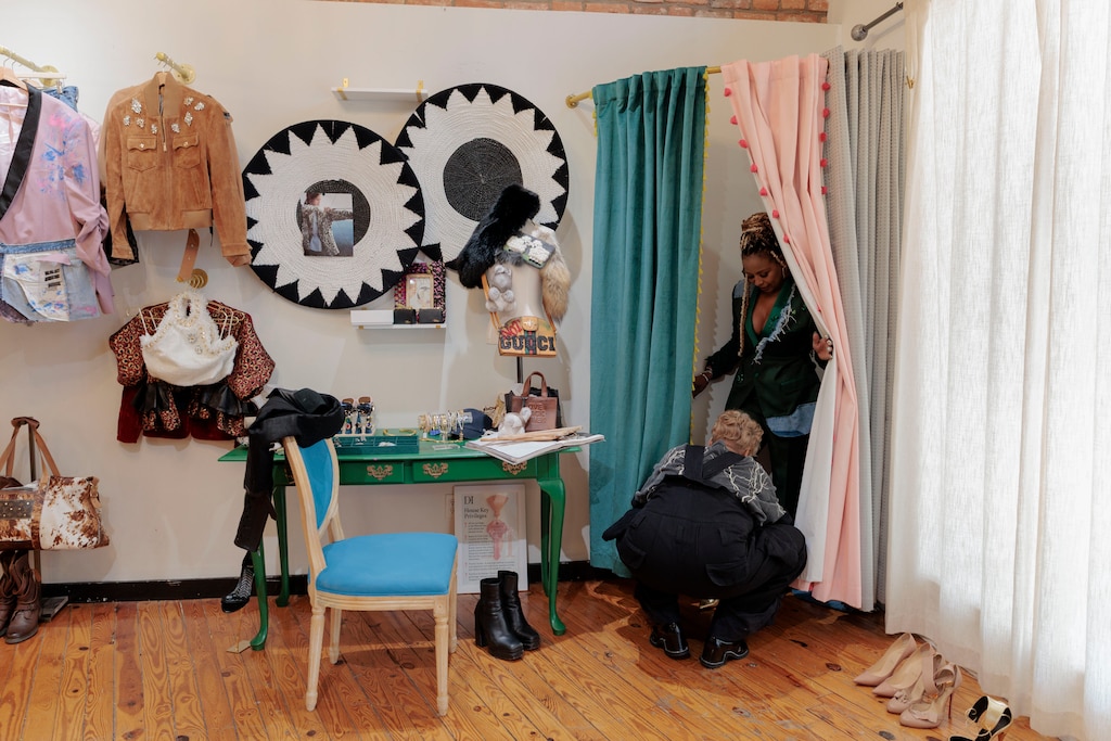 Saturday, April 11, 2026, in Baltimore — Shelonda Stokes, President of the Downtown Partnership of Baltimore and Executive Director of the Downtown Management Authority, gets fitted for a suit by designer Natalie Karyl.