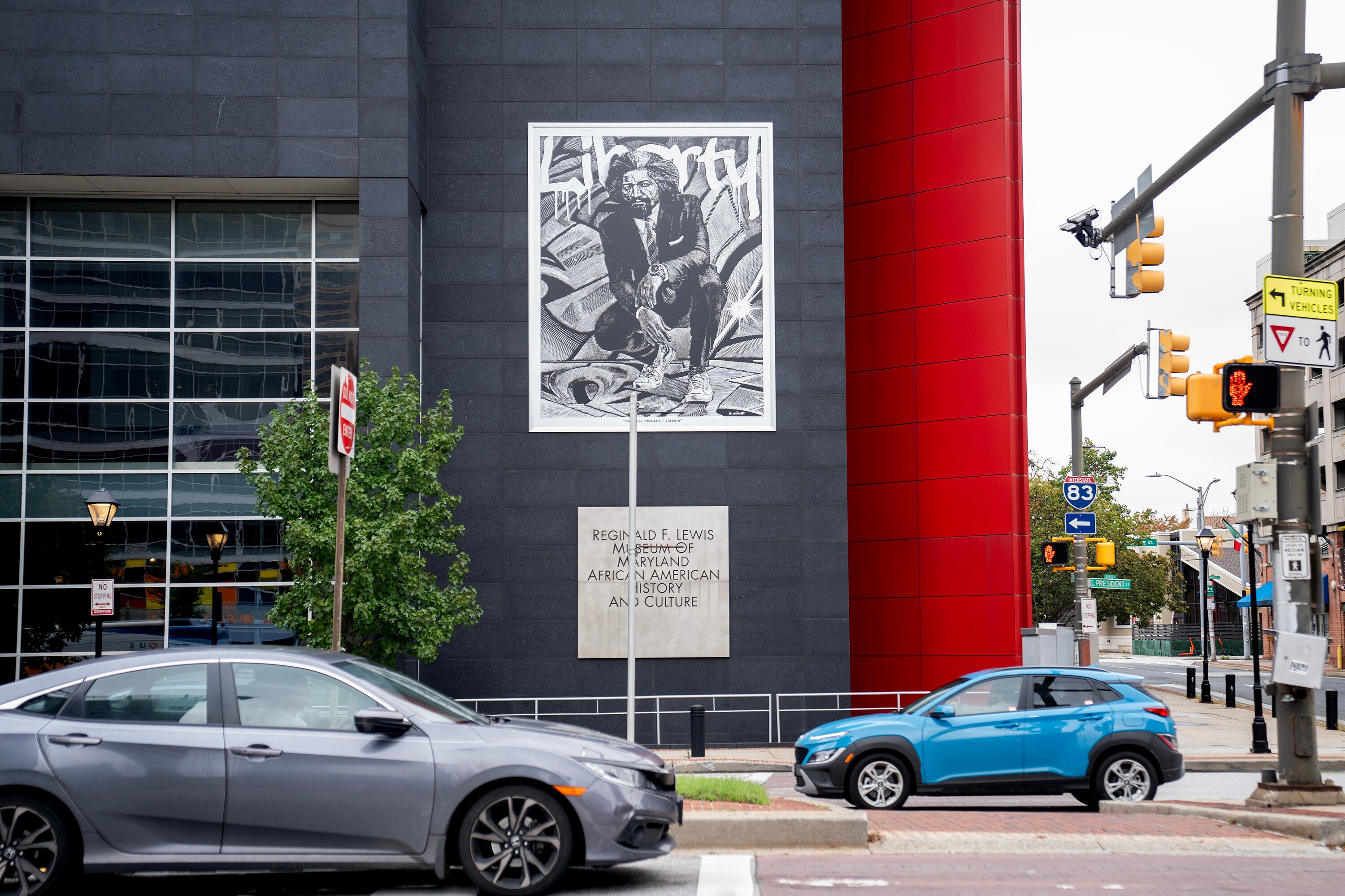 A rendering of Frederick Douglass titled “Frederick Douglass / Liberty” outside the Reginald F. Lewis Museum of Maryland African American History and Culture in Baltimore, Md., on Wednesday, Oct. 2, 2024.