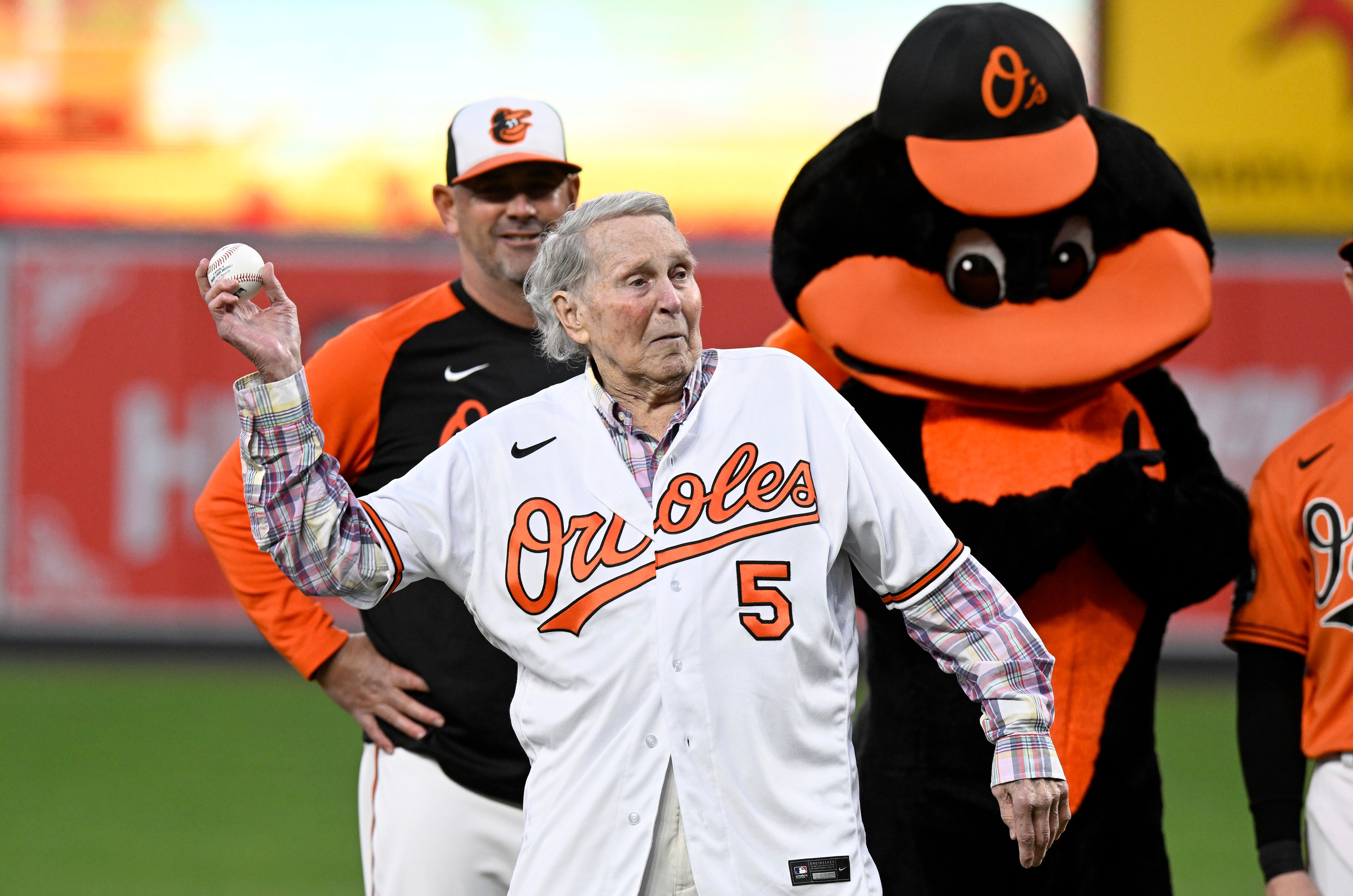 Former Baltimore Orioles and Hall of Famer Brooks Robinson throws out the first pitch before the game between the Baltimore Orioles and the Houston Astros  at Oriole Park at Camden Yards on Sept. 24, 2022 in Baltimore, Maryland. (Photo by Greg Fiume/Getty Images)