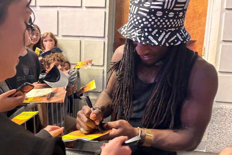 Marcus John, who is from the Eastern Shore and stars as Alexander Hamilton on Broadway, signs autographs for fans outside the theatre last month.