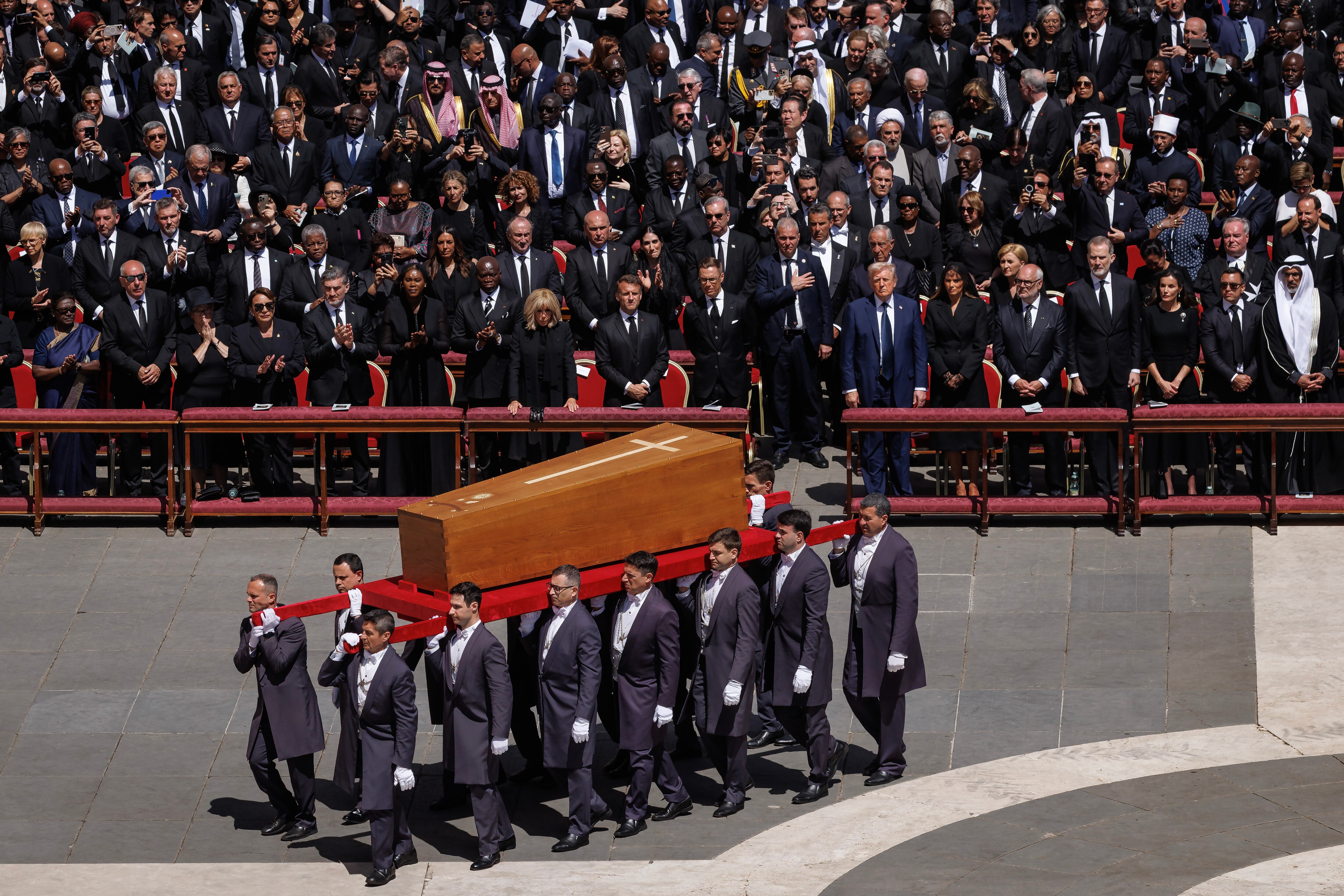 VATICAN CITY, VATICAN - APRIL 26: Guests including France's First Lady Brigitte Macron, France's President Emmanuel Macron, Finland'S President Alexander Stubb, US President Donald Trump, US First Lady Melania Trump, Estonian President Alar Karis, King Felipe VI of Spain, Queen Letizia of Spain, Ecuador's President Daniel Noboa and His Highness Abu Dhabi's Crown Prince and President of the United Arab Emirates Sheikh Khaled Bin Mohammed Bin Zayed Al Nahyan attend the funeral of Pope Francis in St. Peter’s Square on April 26, 2025 in Vatican City, Vatican. Pope Francis died on April 21st at the age of 88. Born in Argentina as Jorge Mario Bergoglio, he was the first Latin American and the first Jesuit to become Pope when elected in 2013. Taking the name Francis after St Francis of Assisi, he promoted a more humble version of the papacy than many of his predecessors. He will be buried outside of the Vatican in a simple wooden coffin at the Basilica Santa Maria Maggiore. (Photo by Dan Kitwood/Getty Images)