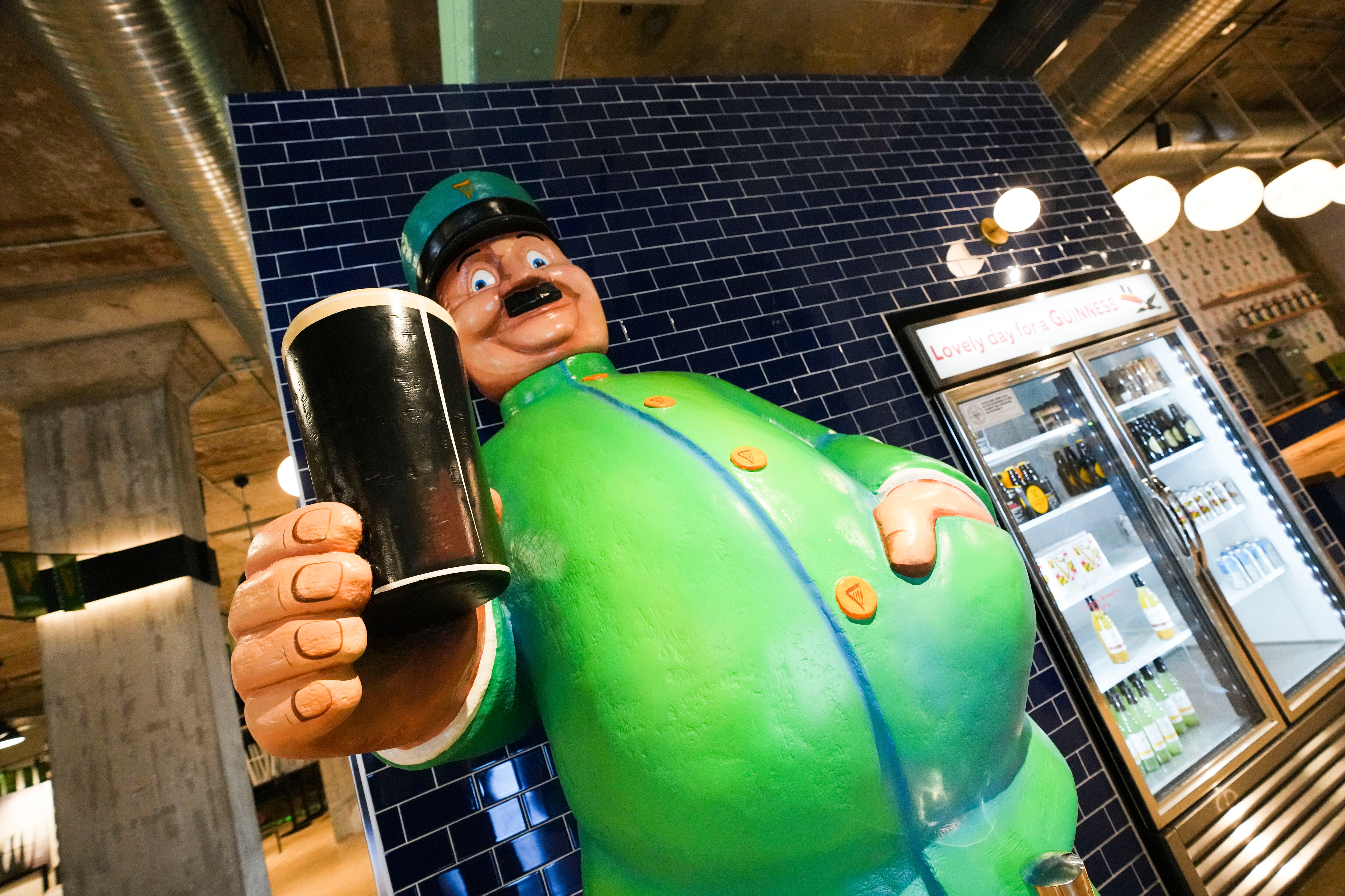 A statue of a beer man greets visitors to the Guinness Open Gate brewery.