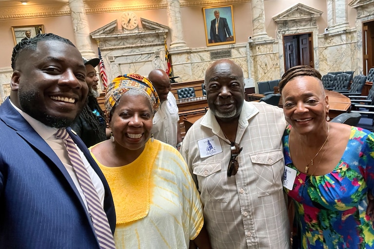 Rae Gaskins, third from left, with his grandson Malcolm Ruff, his daughter Martha Ruff and his wife Alice Gaskins at Malcolm's swearing into the House of Delegates at the State house in 2023.