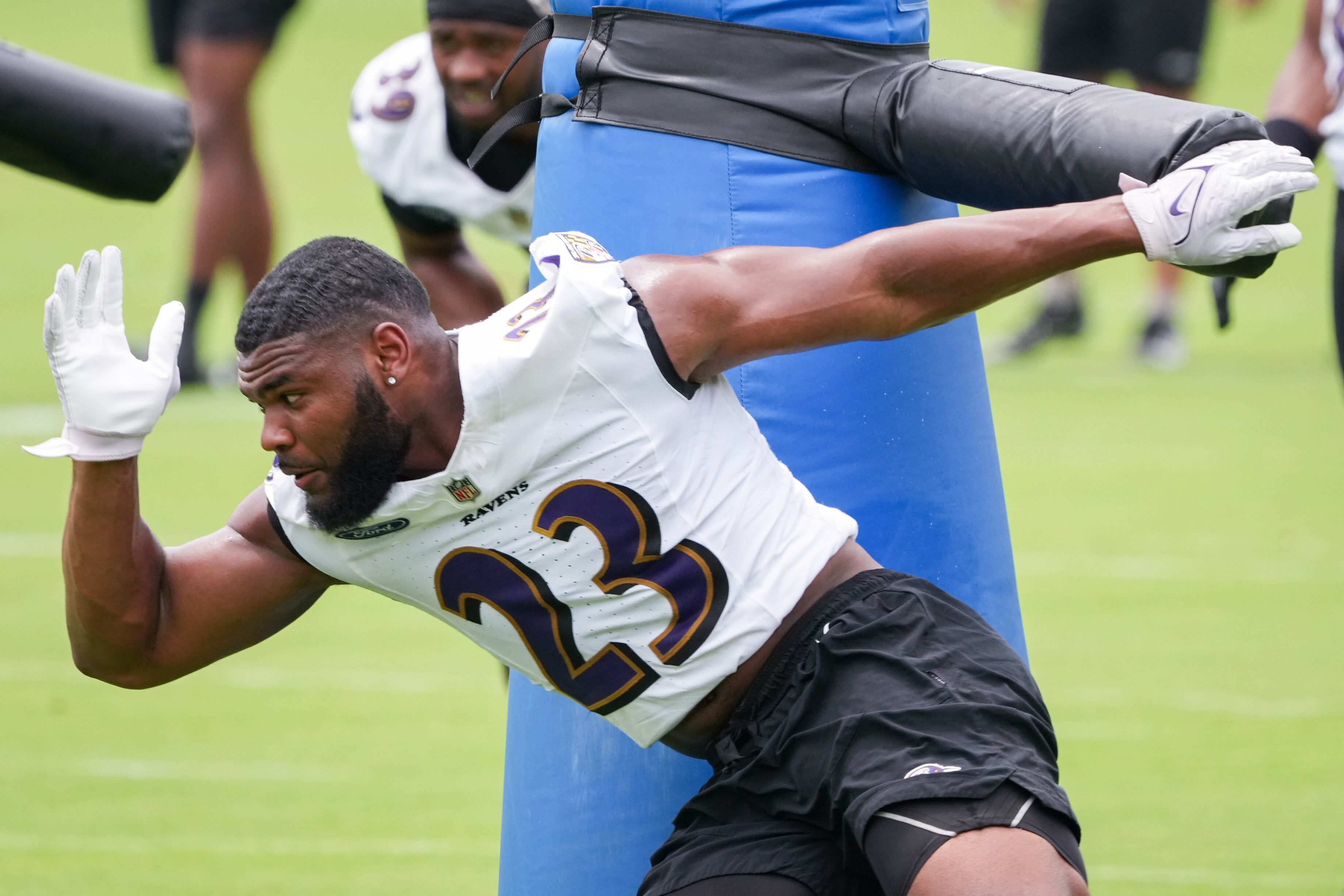 Inside Linebacker Trenton Simpson (23) completes a drill during the Baltimore Ravens’ organized team activities on June 6.