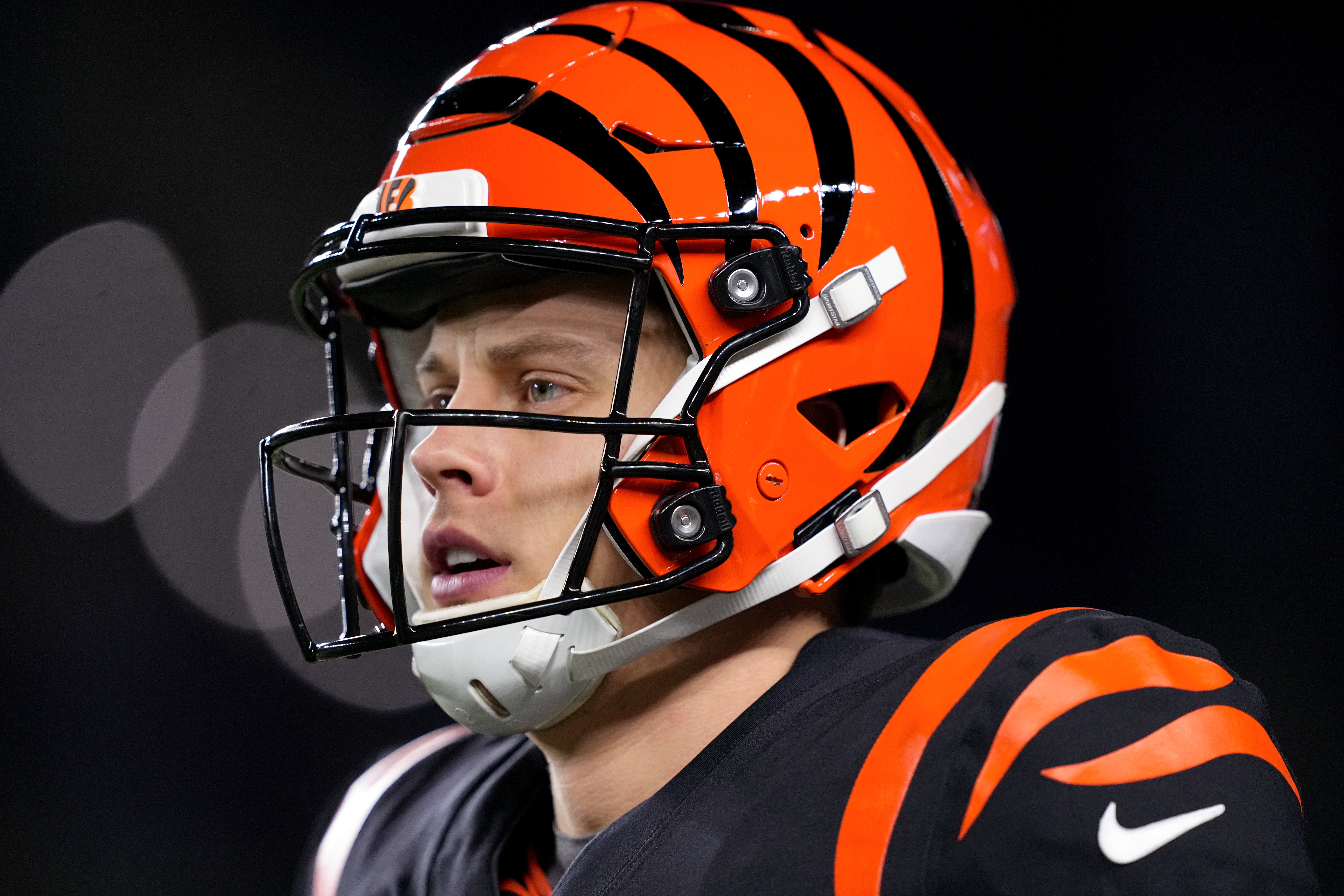 CINCINNATI, OHIO - JANUARY 15: Joe Burrow #9 of the Cincinnati Bengals warms up prior to the AFC Wild Card playoff game against the Baltimore Ravens at Paycor Stadium on January 15, 2023 in Cincinnati, Ohio. (Photo by Dylan Buell/Getty Images)