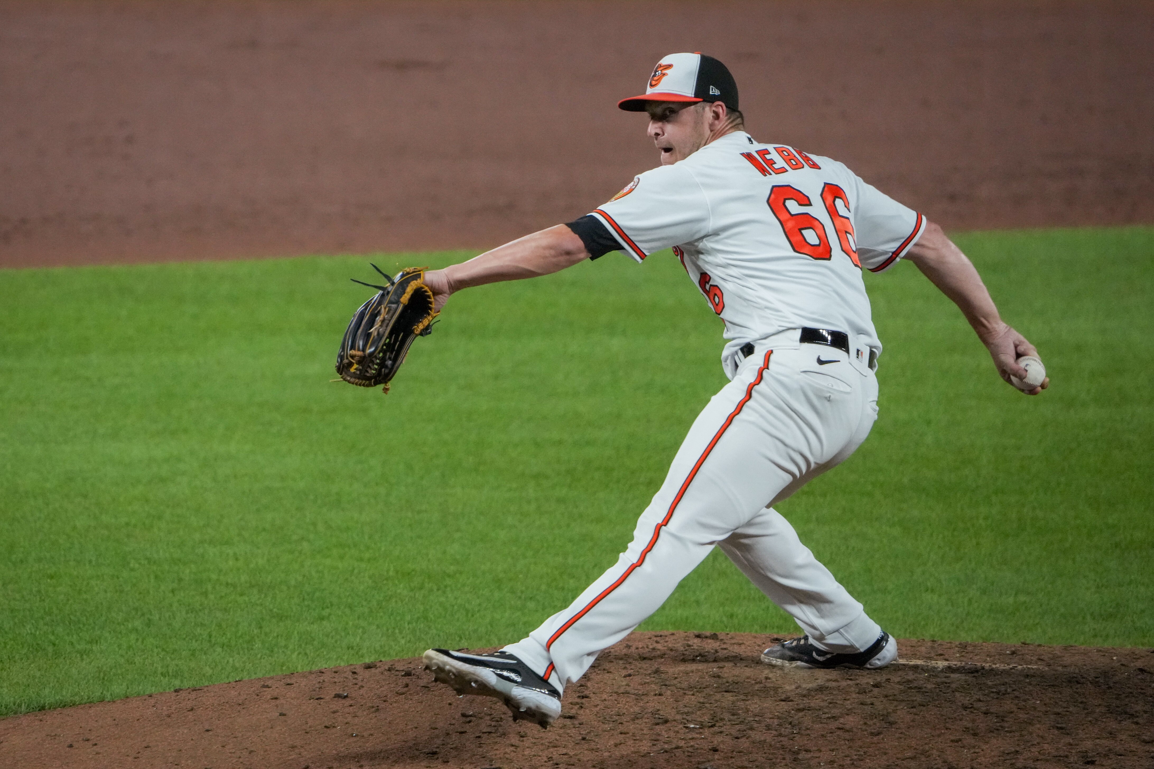 Baltimore Orioles relief pitcher Jacob Webb (66) pitches during his debut as an Oriole during a baseball game against the Houston Astros at Orioles Park at Camden Yards in Baltimore on Aug. 9, 2023.