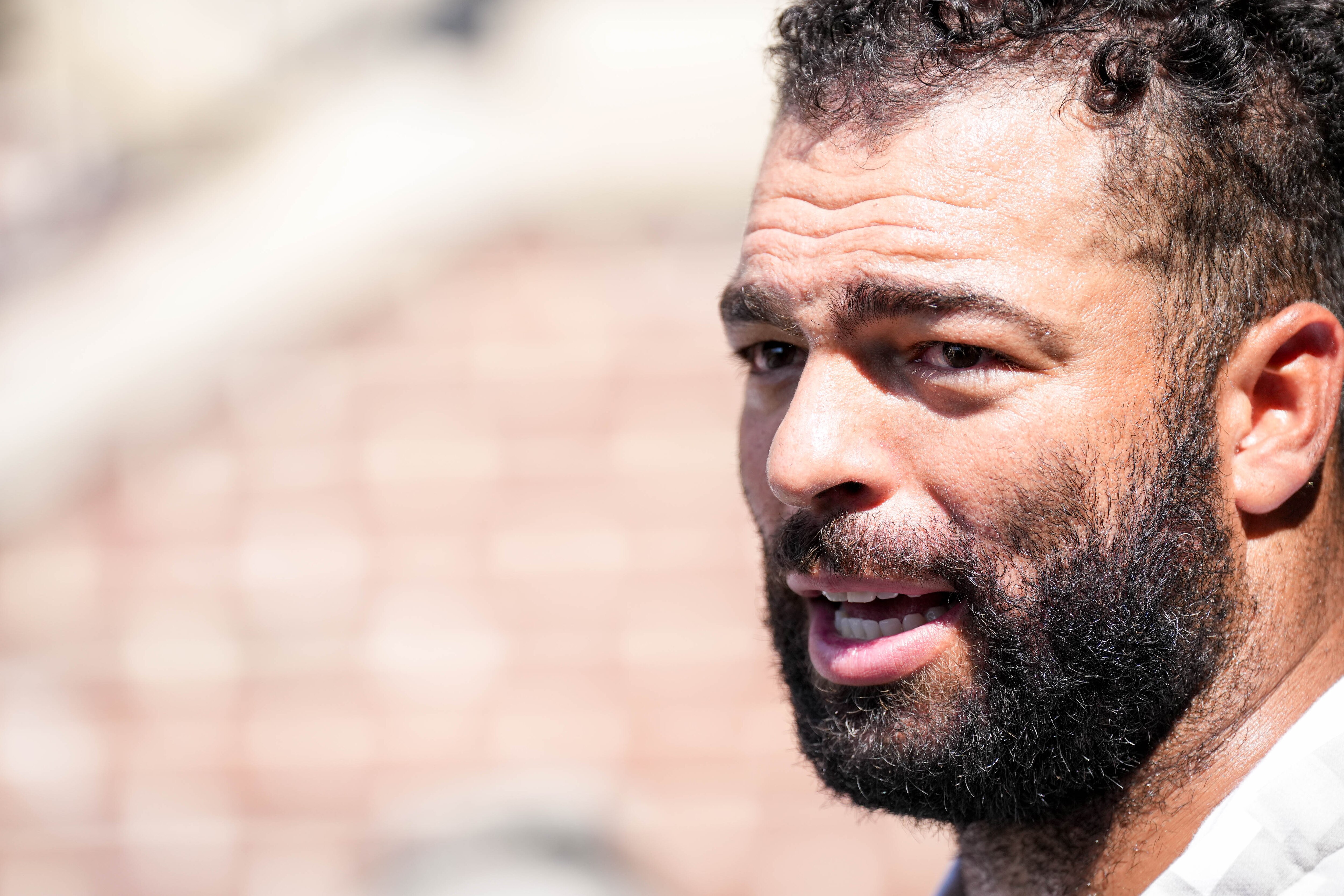 Ravens linebacker Kyle Van Noy takes questions from reporters following practice on July 24.