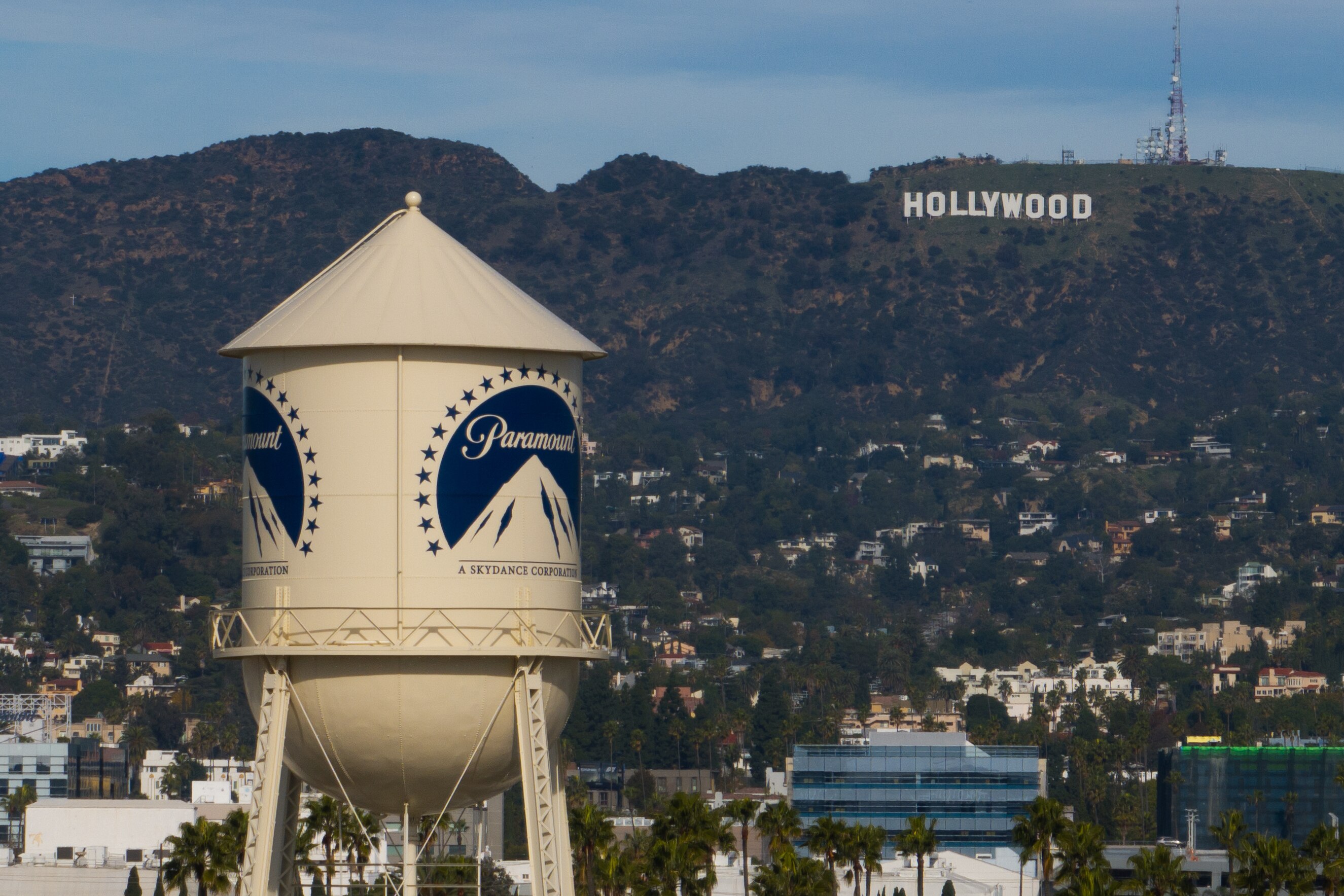 The Paramount Pictures water tower is seen in Los Angeles, Dec. 18, 2025, with the Hollywood sign in the distance. (AP Photo/Jae C. Hong, File)