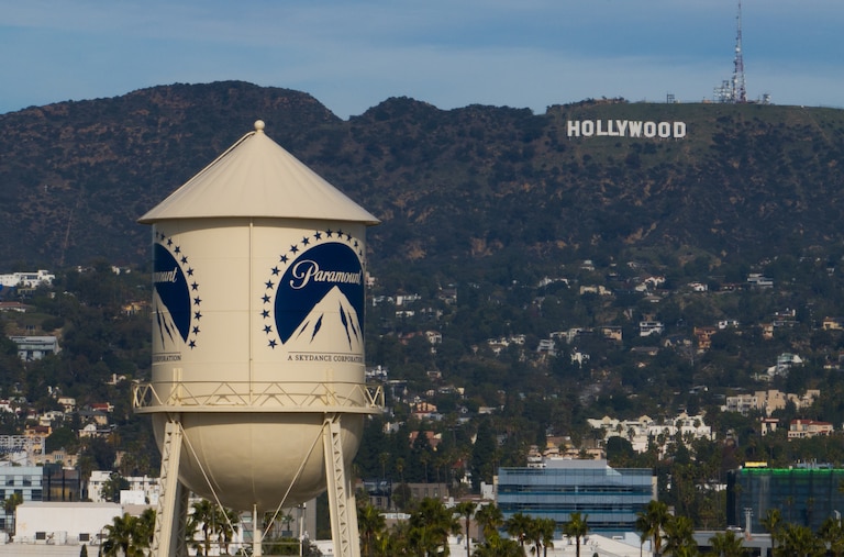 The Paramount Pictures water tower is seen in Los Angeles, Dec. 18, 2025, with the Hollywood sign in the distance. (AP Photo/Jae C. Hong, File)