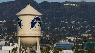 The Paramount Pictures water tower is seen in Los Angeles, Dec. 18, 2025, with the Hollywood sign in the distance. (AP Photo/Jae C. Hong, File)