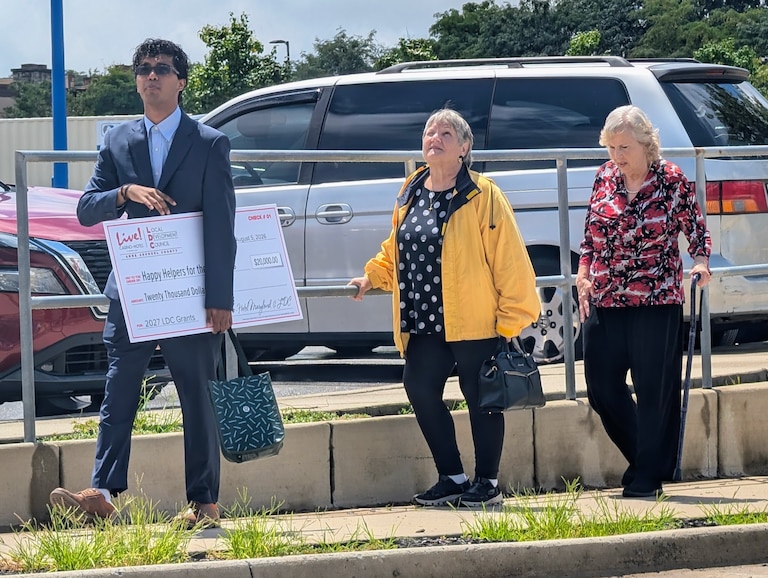 Volunteers with Happy Helpers for the Homeless walked out of the luncheon at Maryland Live! Casino with a $20,000 check.