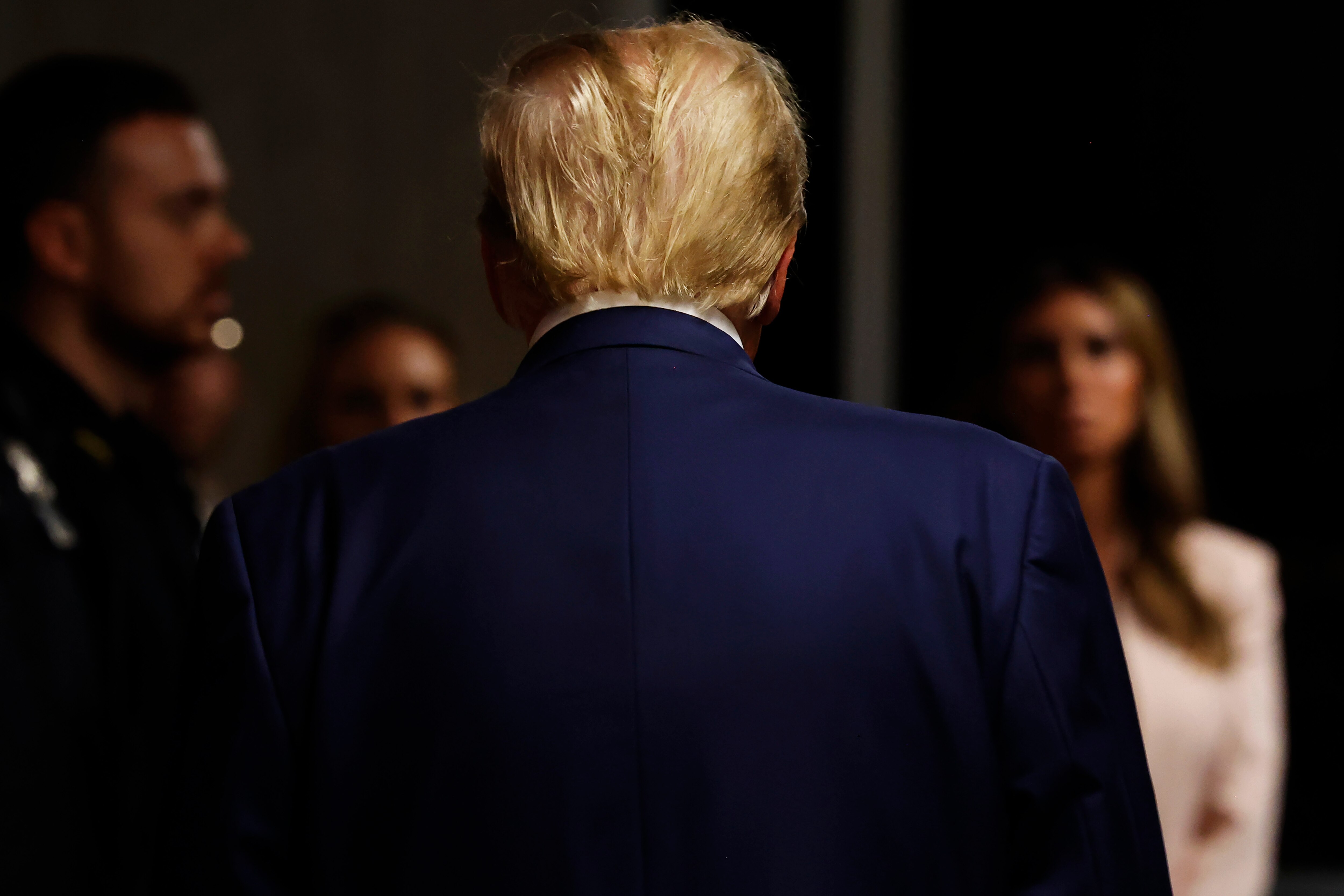 Former President Donald Trump leaves after giving end-of-the-day remarks during his hush money trial at Manhattan Criminal Court in May.