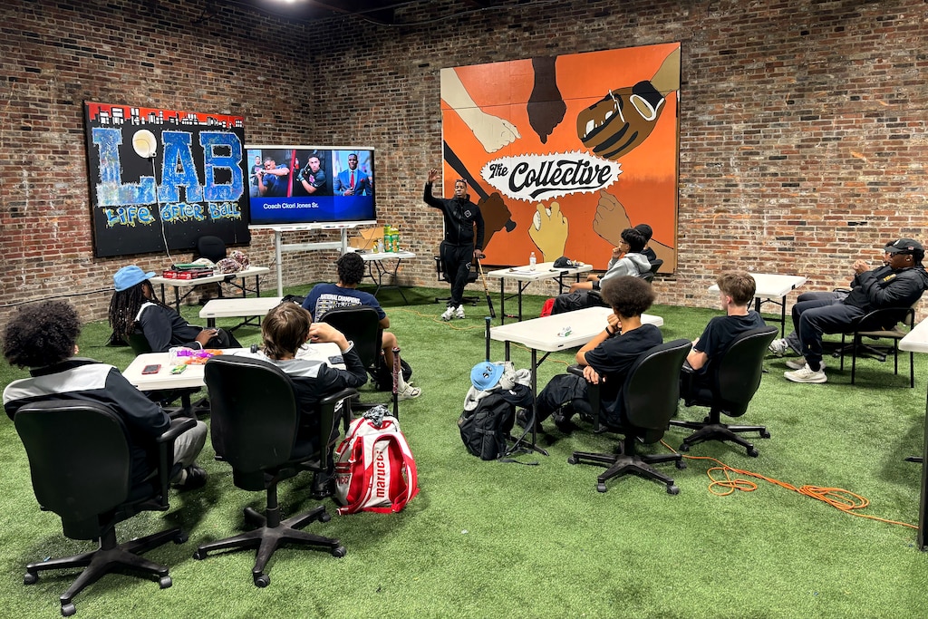 Digital Harbor's varsity baseball team meets at the Diamond Collective on Monday afternoon for a practice led by CKori Jones, who co-owns the facility.
