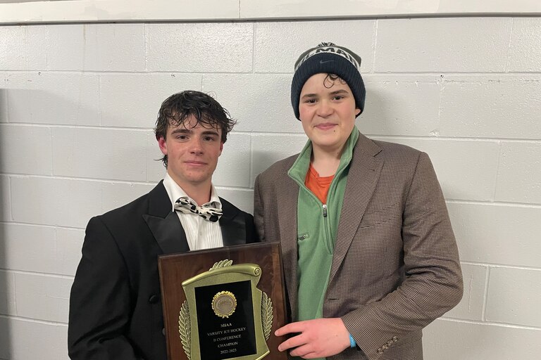 Behind the efforts of Oscar Woloson (left) and Simeon Schlagger, Gilman claimed the MIAA B Conference hockey championship Thursday. The Greyhounds defeated St. Paul's, 6-4, at The Gardens Ice House in Laurel.