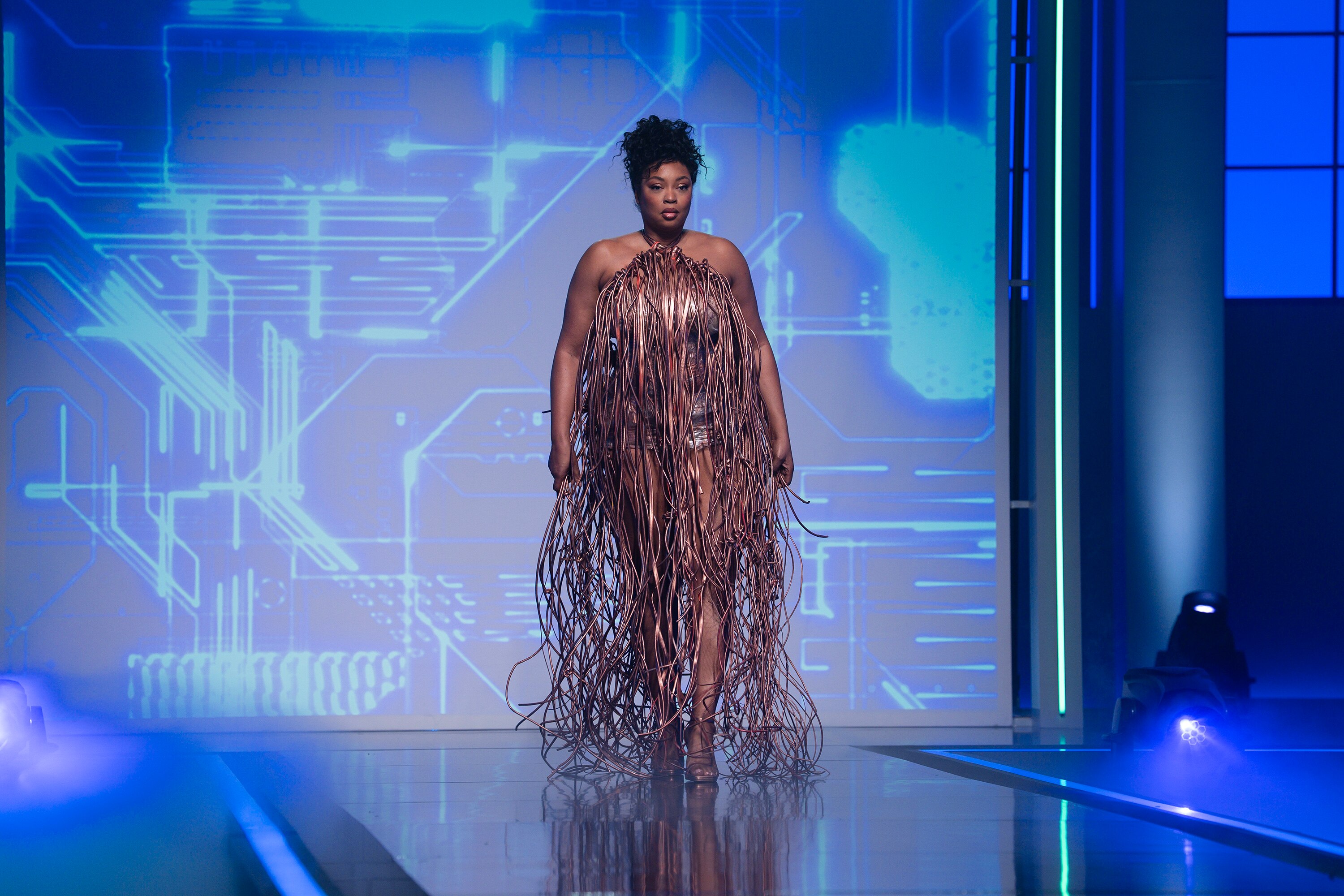 PROJECT RUNWAY – "Battle of the Seasons" - The season 22 designers join forces to take on returning competitors from season 21 in the classic unconventional materials challenge. Familiar faces and unexpected materials create a high-stakes showdown. Liris Crosse walks the runway. (Disney/Spencer Pazer) PROJECT RUNWAY