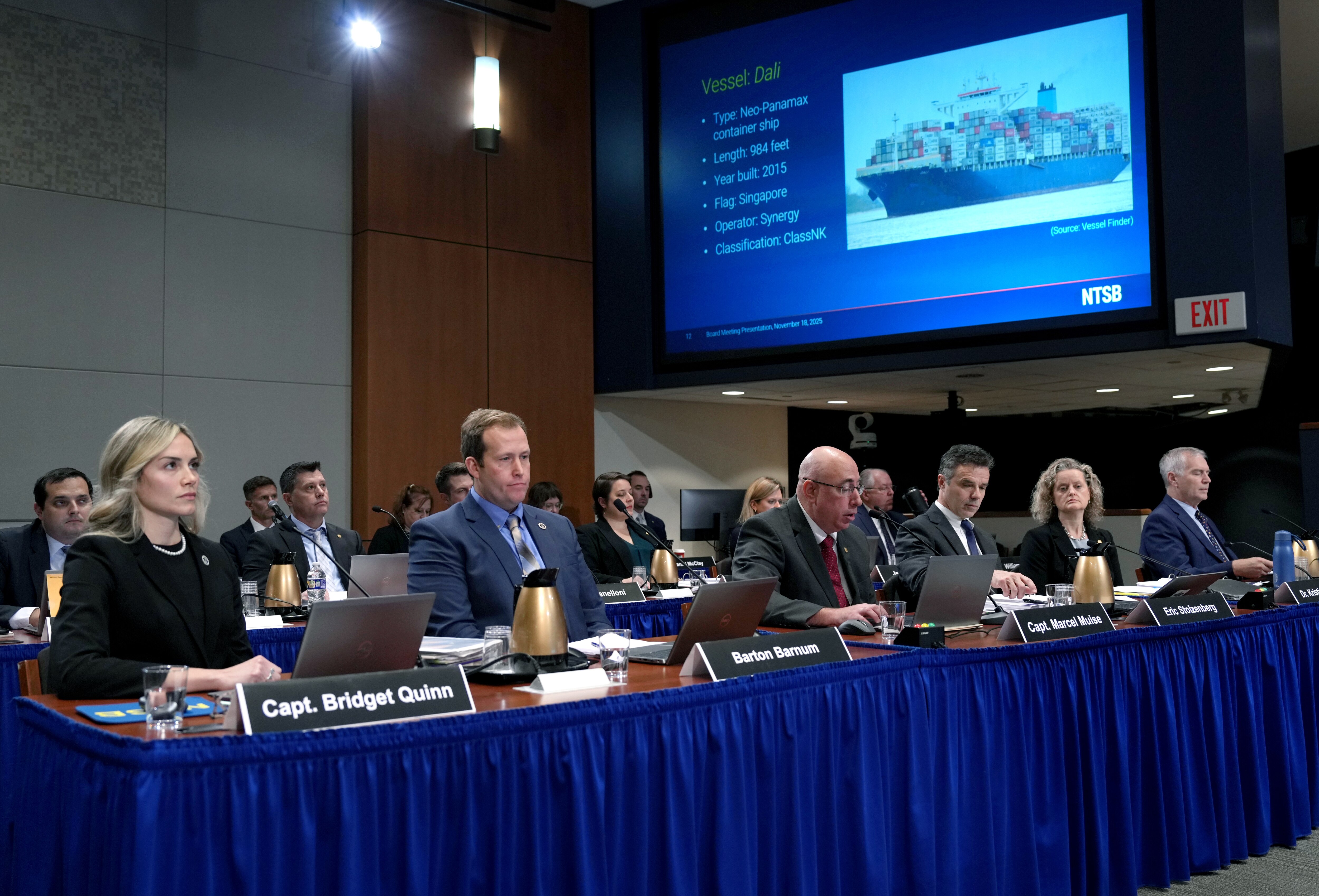 Marine Accident Investigator Marcel Muise, seated center, leads a staff presentation about the 2024 Francis Scott Key Bridge collapse during a National Transportation Safety Board meeting in Washington, D.C., on Tuesday.