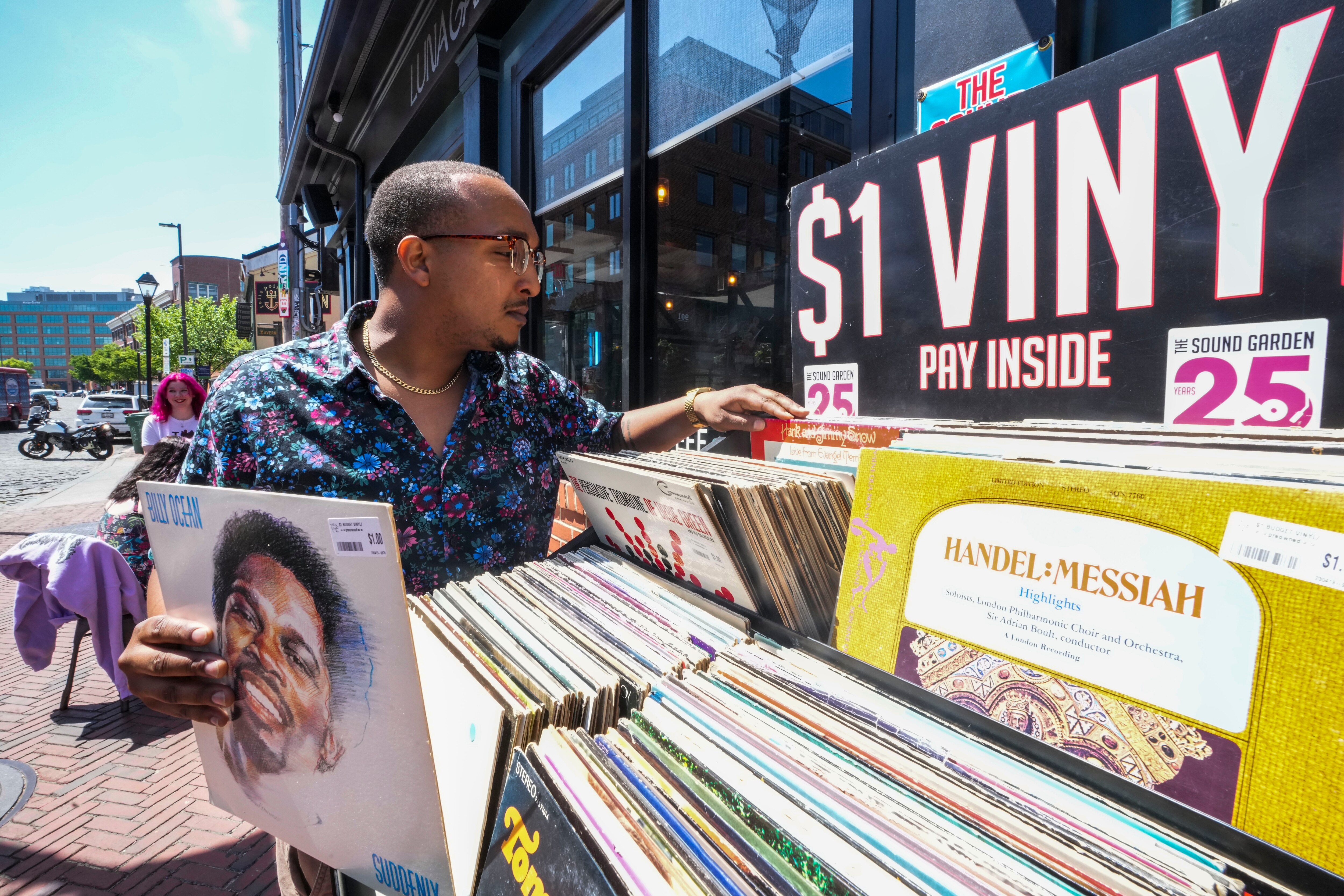 DJ Dagm Endalkachew browses for records at Soundgarden a few days before Record Store Day on April 19, 2023.