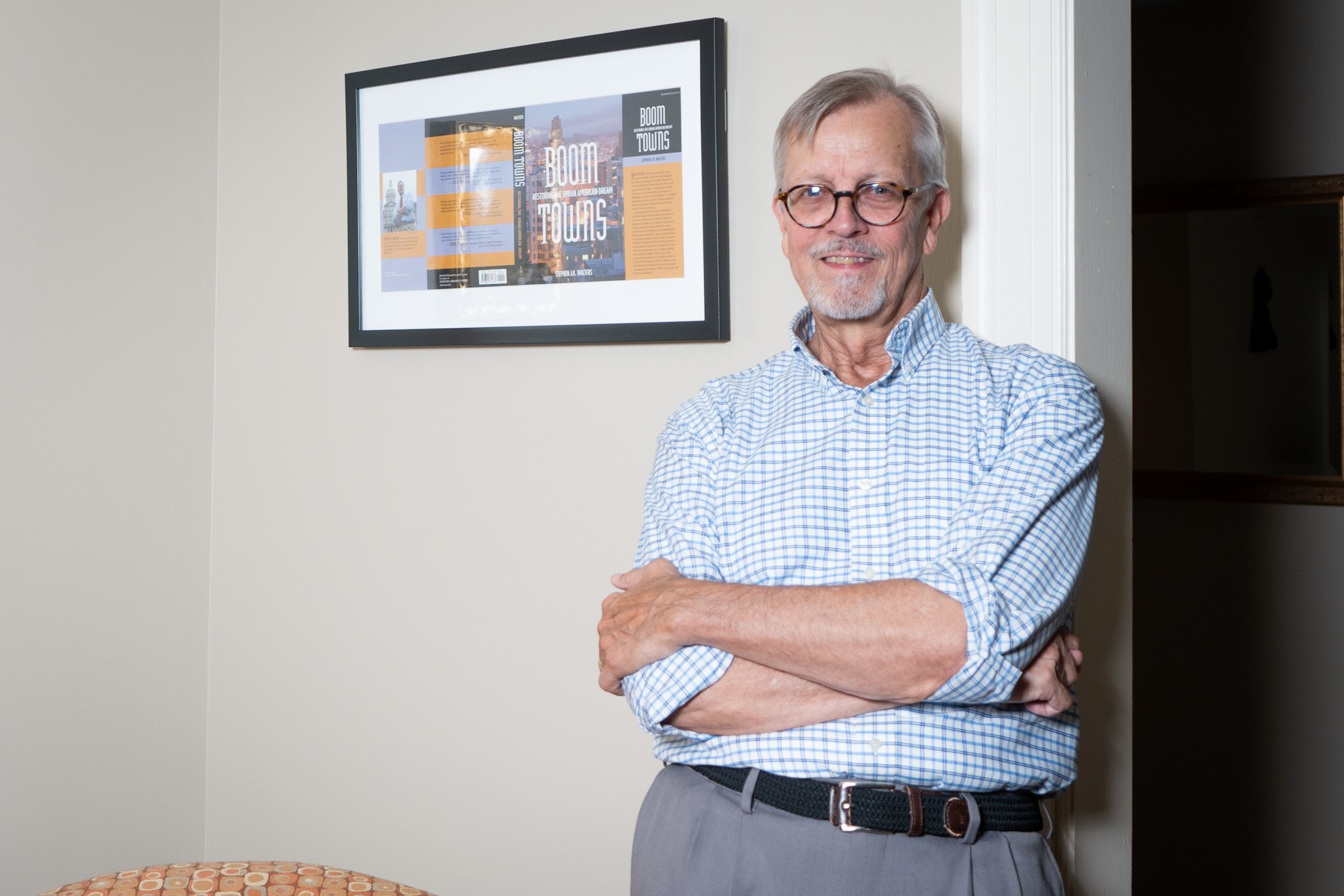 Former Loyola University professor Stephen Walters poses for a portrait in his Baltimore condo on July 12, 2024.